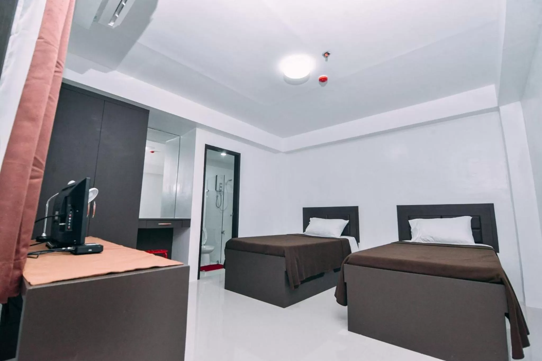 Studio Twin in The Strand Suites and Dormitel