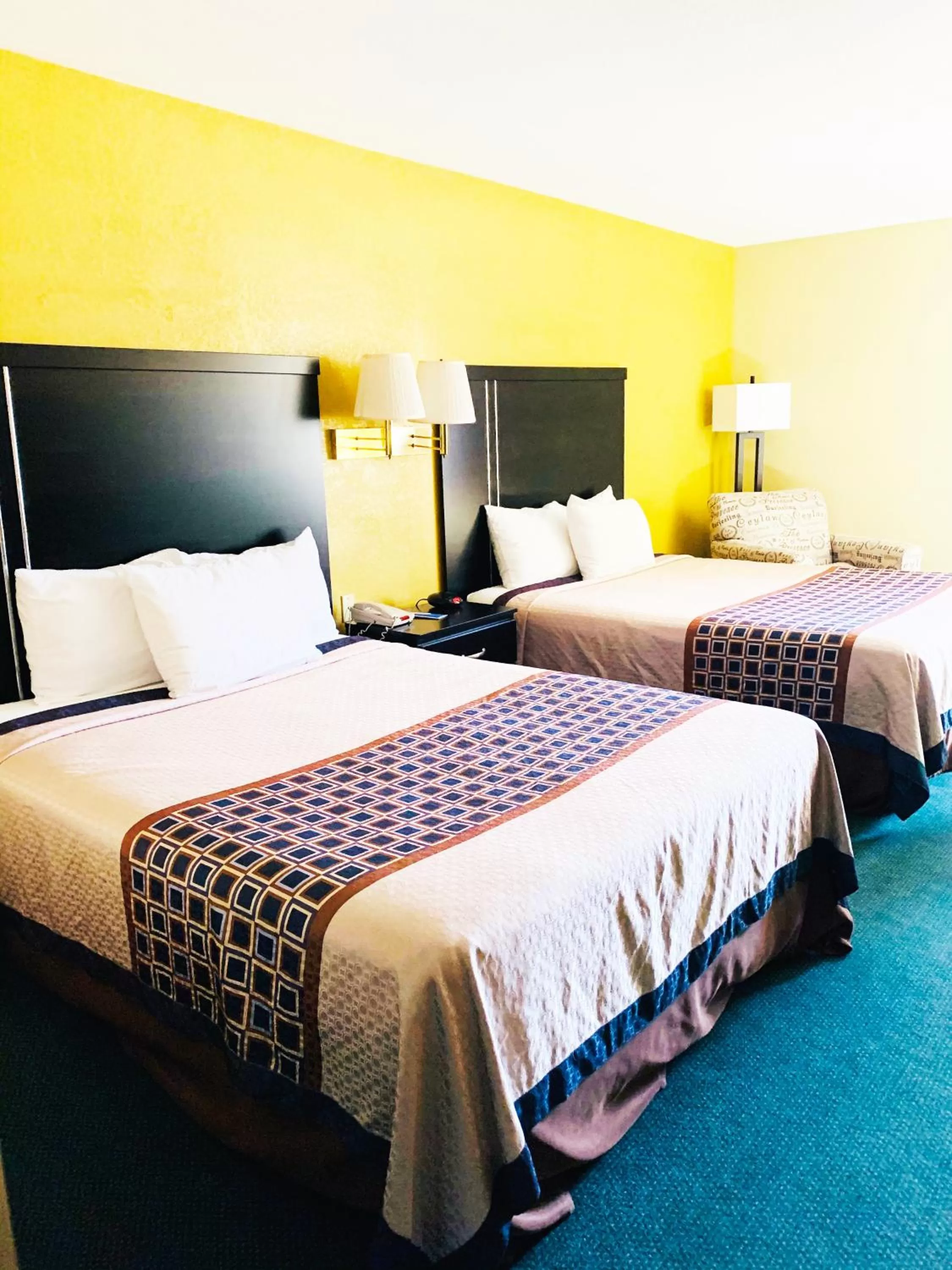 Queen Room with Two Queen Beds - Non-Smoking in Rodeway Inn & Suites