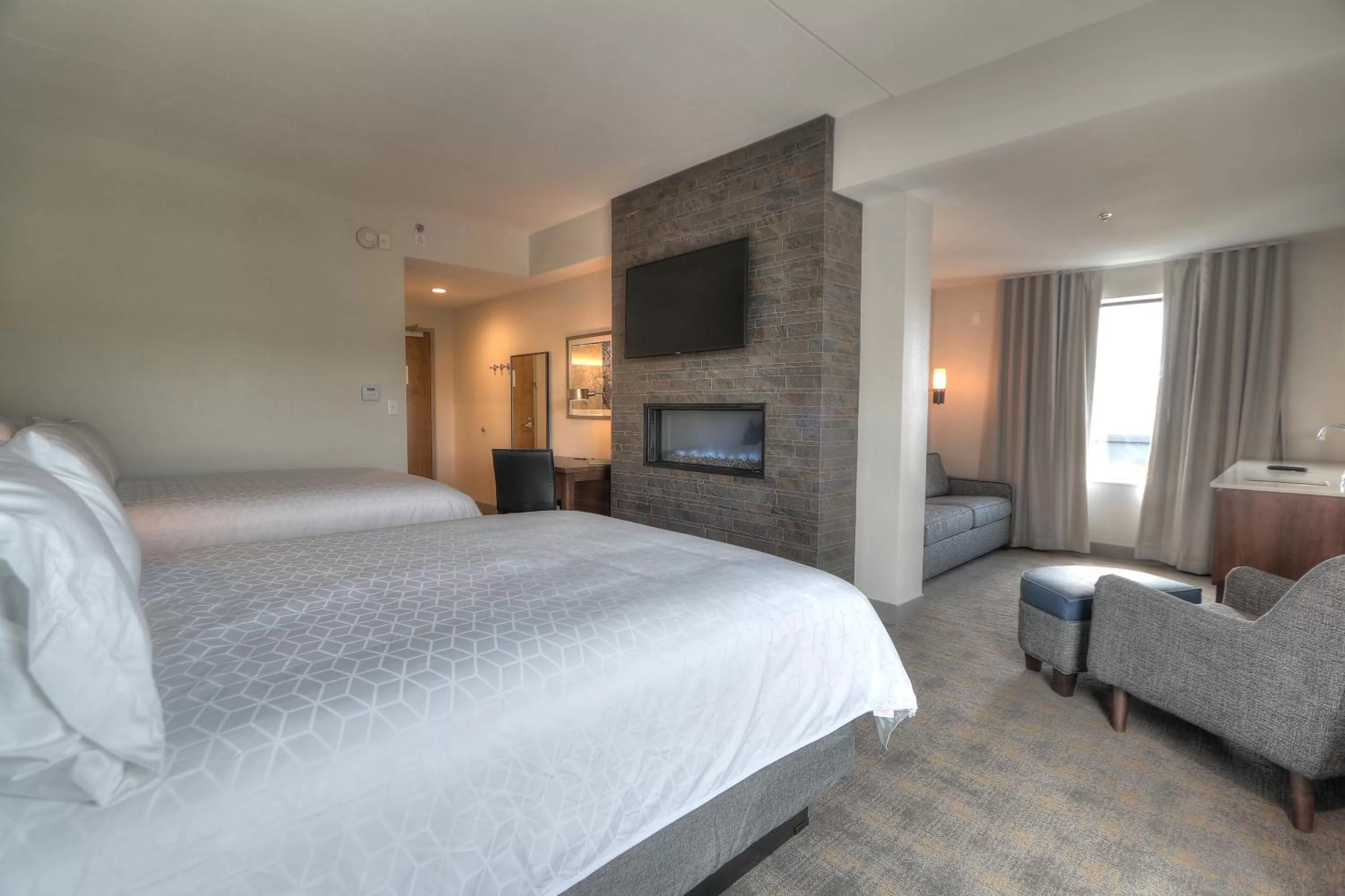 One-Bedroom Suite with Two Queen Beds and Sofa Bed in Holiday Inn & Suites Pigeon Forge Convention Center by IHG