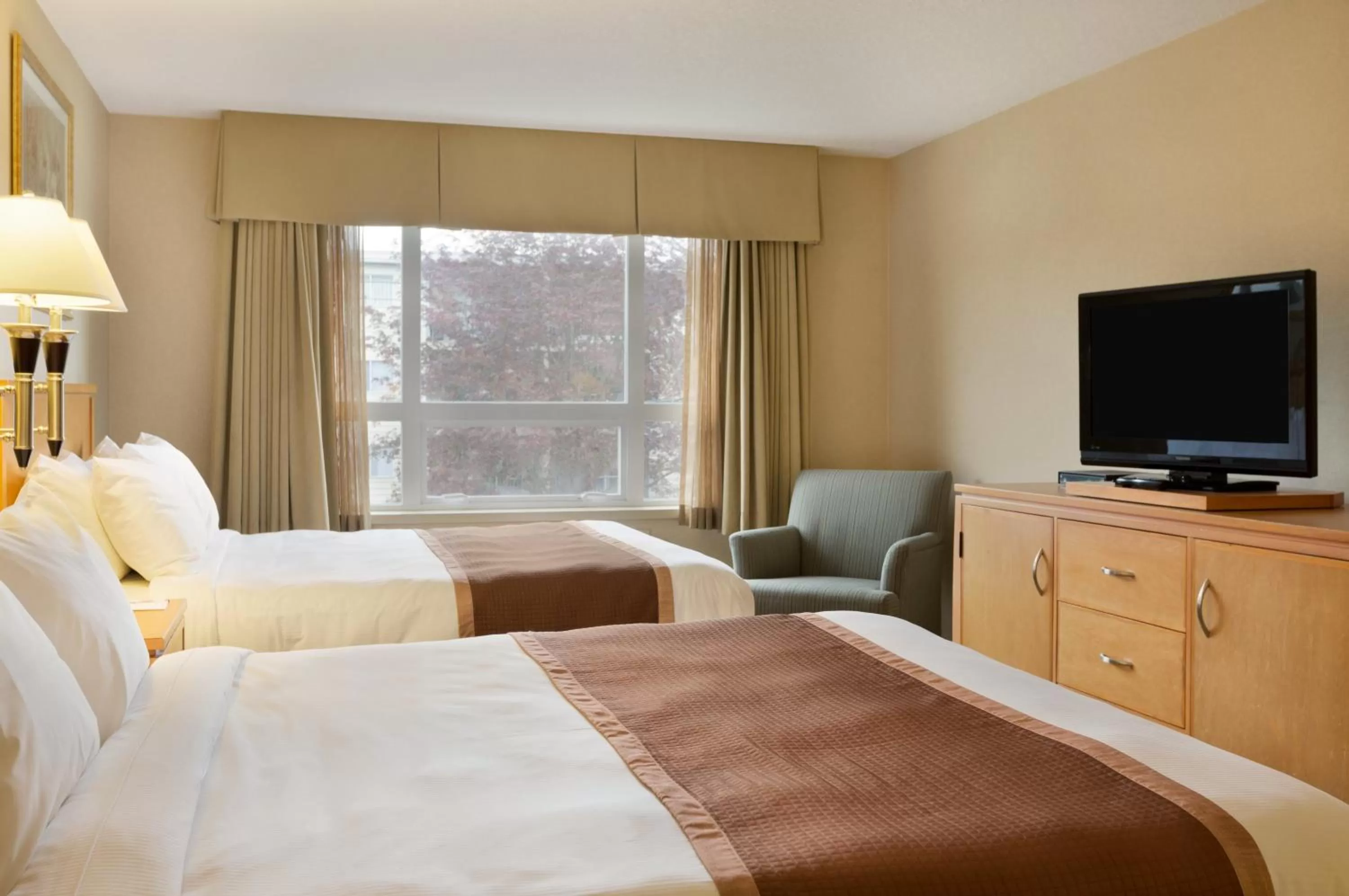 Queen Room with Two Queen Beds - Partially Accessible - Non-Smoking in Ramada by Wyndham Nanaimo