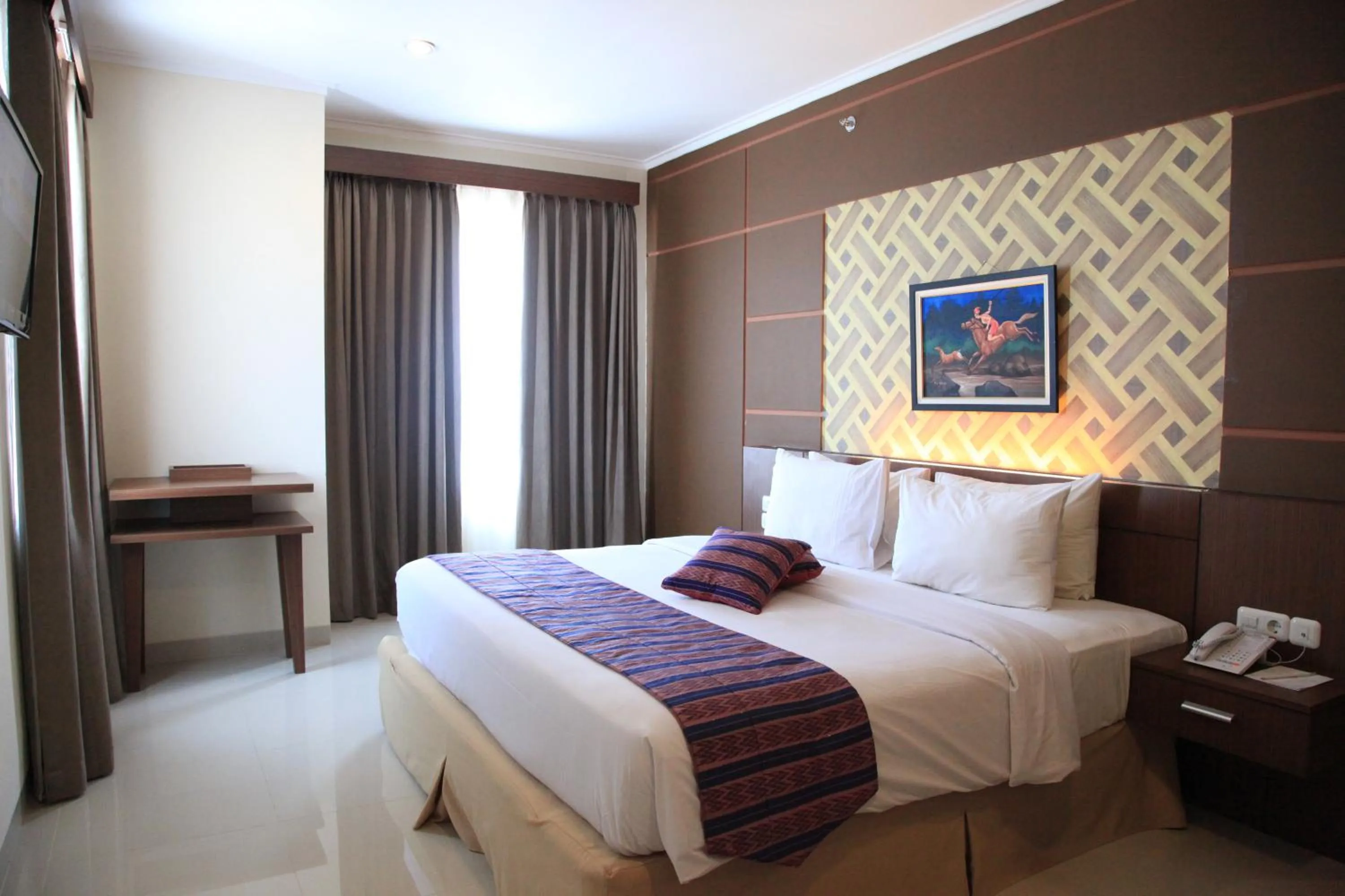 Executive Double Room in Aerotel Smile Losari