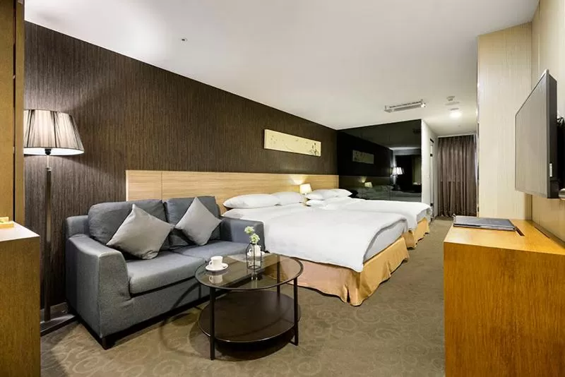 Deluxe Quadruple Room in Beacon Hotel