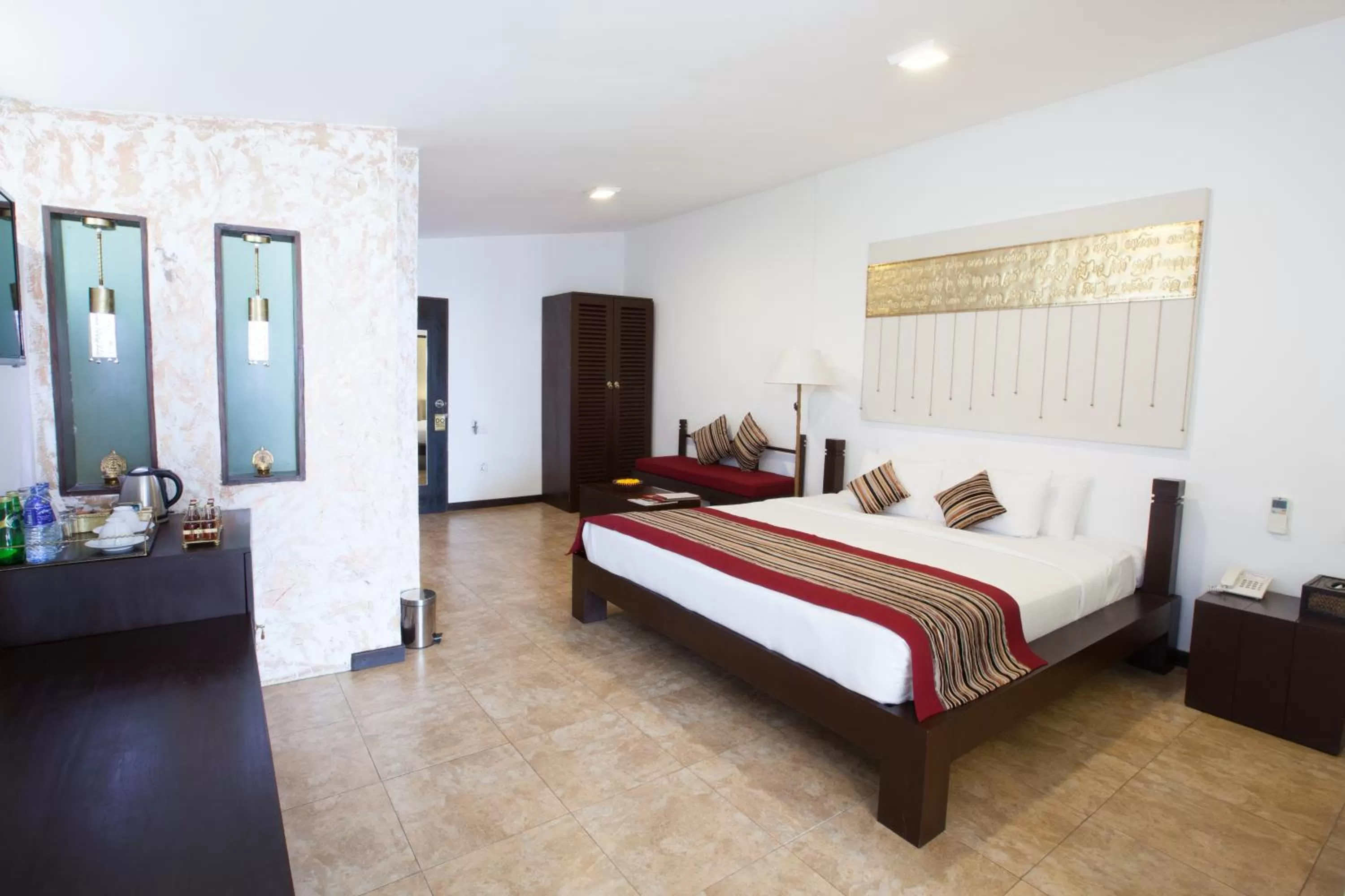 Junior Suite with 10% off on selected wines in The Theva Residency