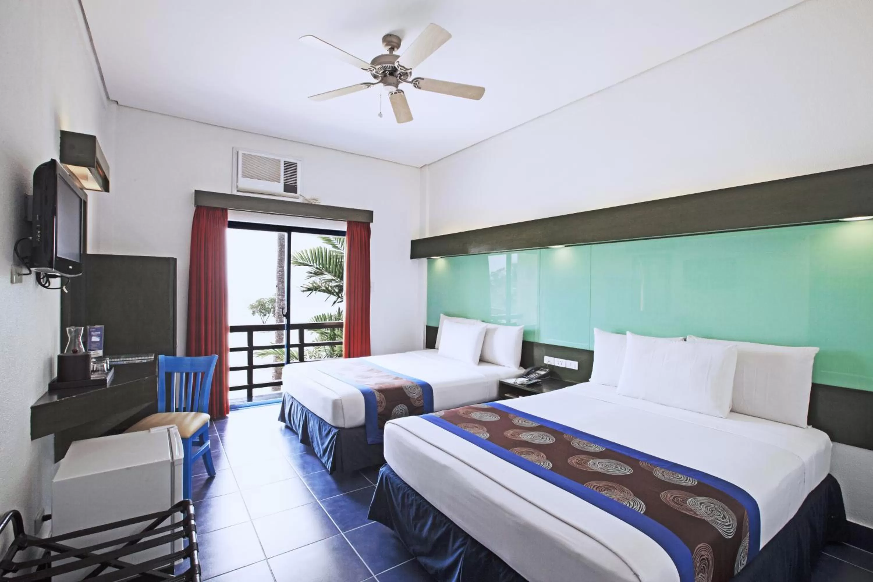 2 Queen Beds Room - Beach View in Microtel by Wyndham Puerto Princesa