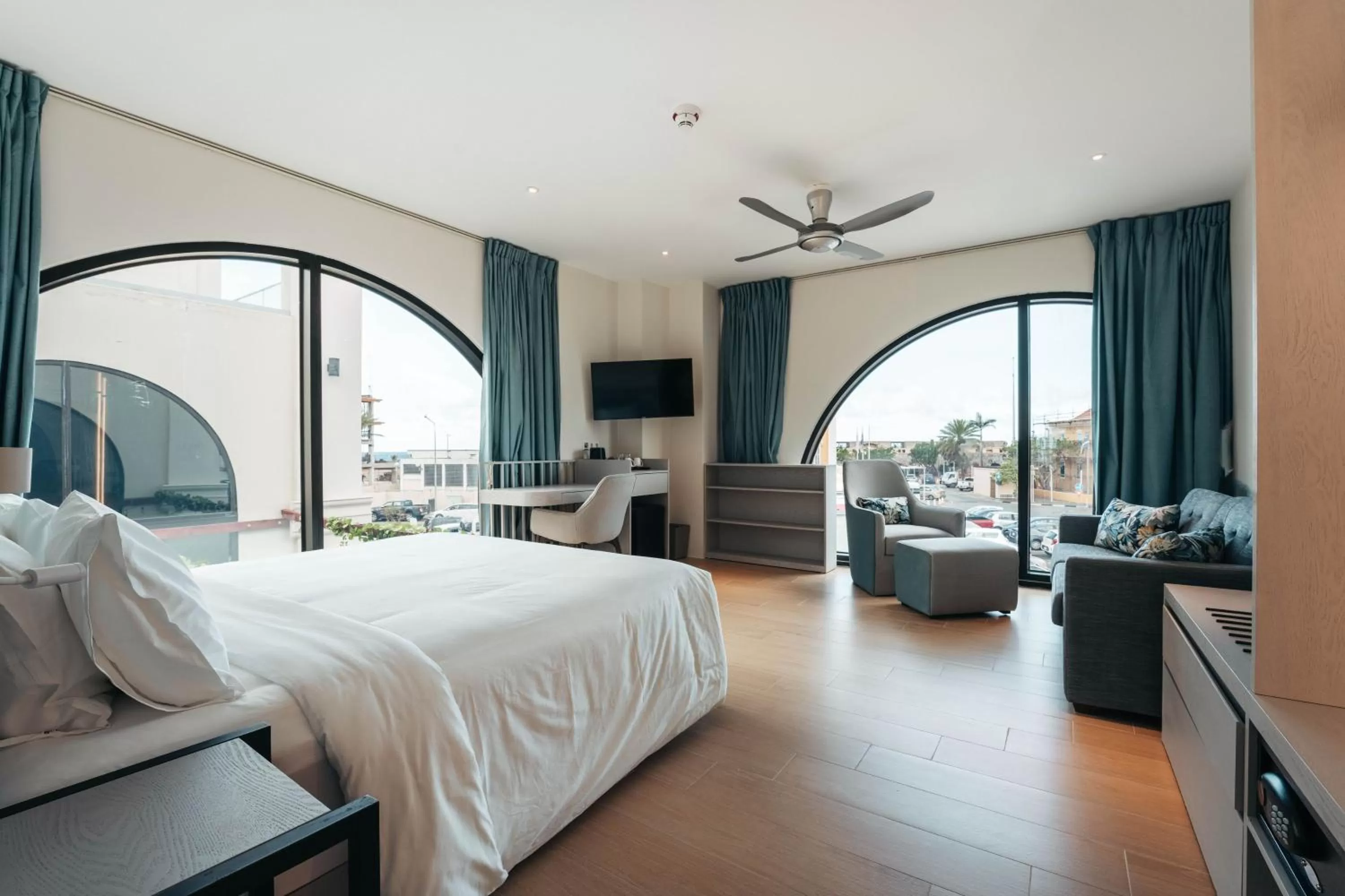 Junior Studio Suite, 1 King Bed, City & Limited Ocean View in Elements Hotel & Shops Curaçao