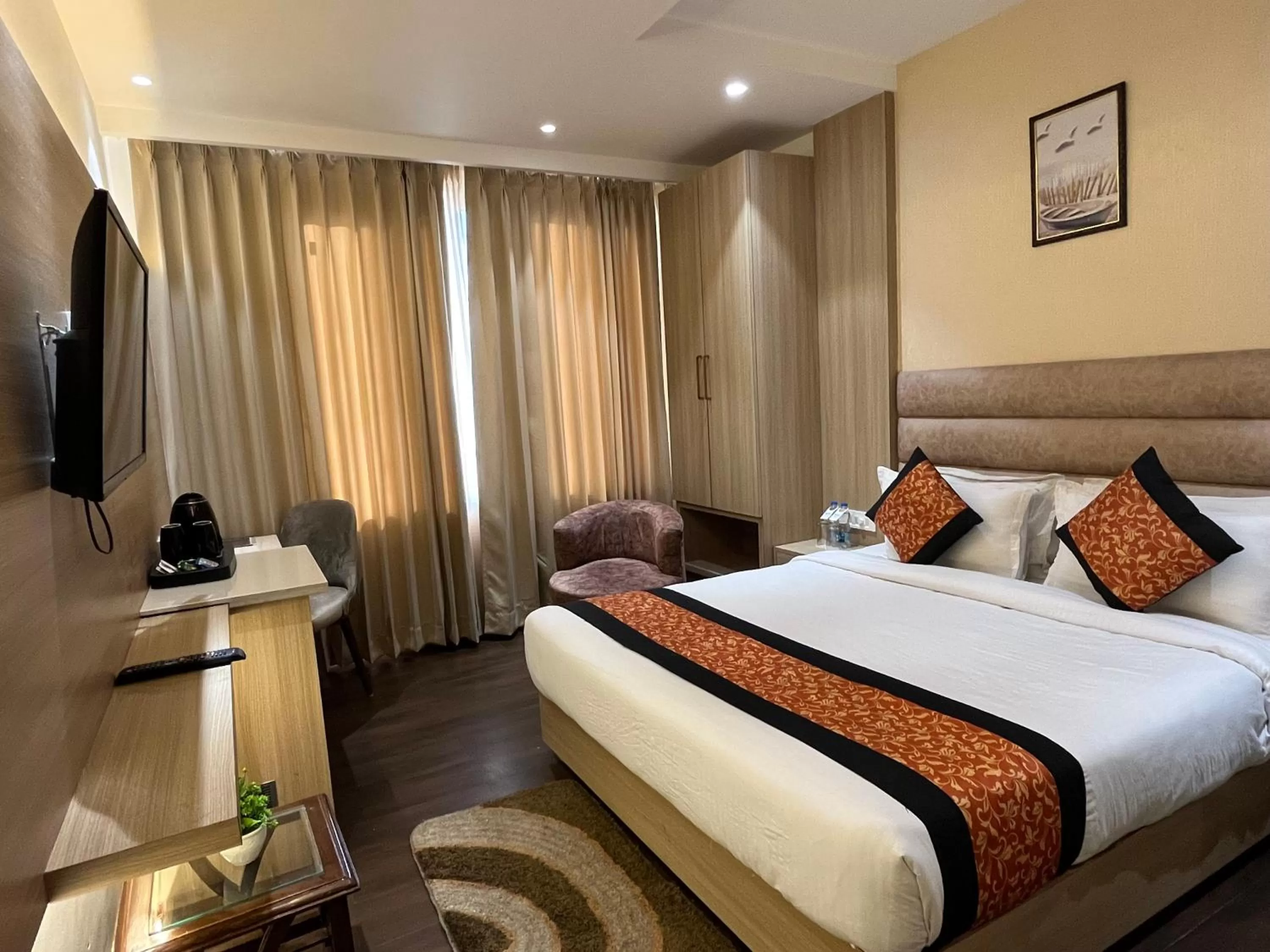 Deluxe Room in RRV Hotel