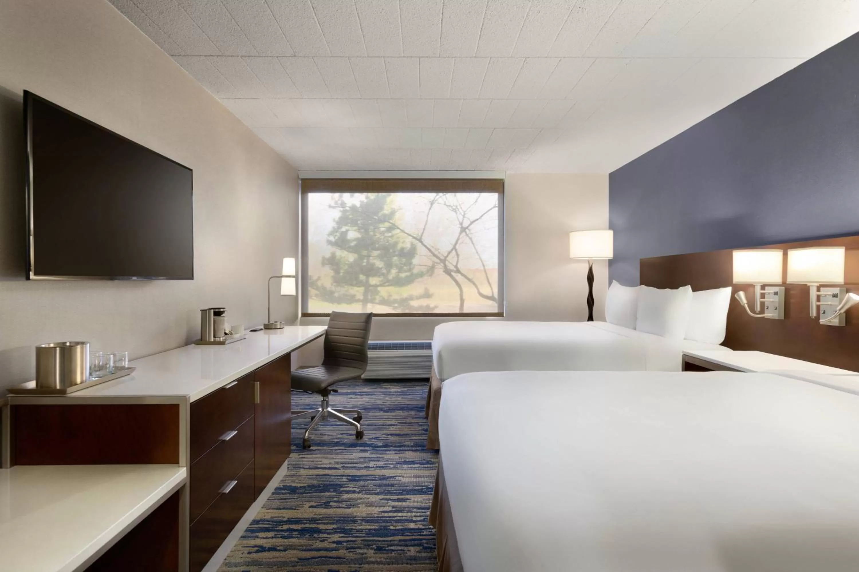 Guest Room with Two Queen Beds in Skyline Hotel Detroit Airport, SureStay Collection by Best Western