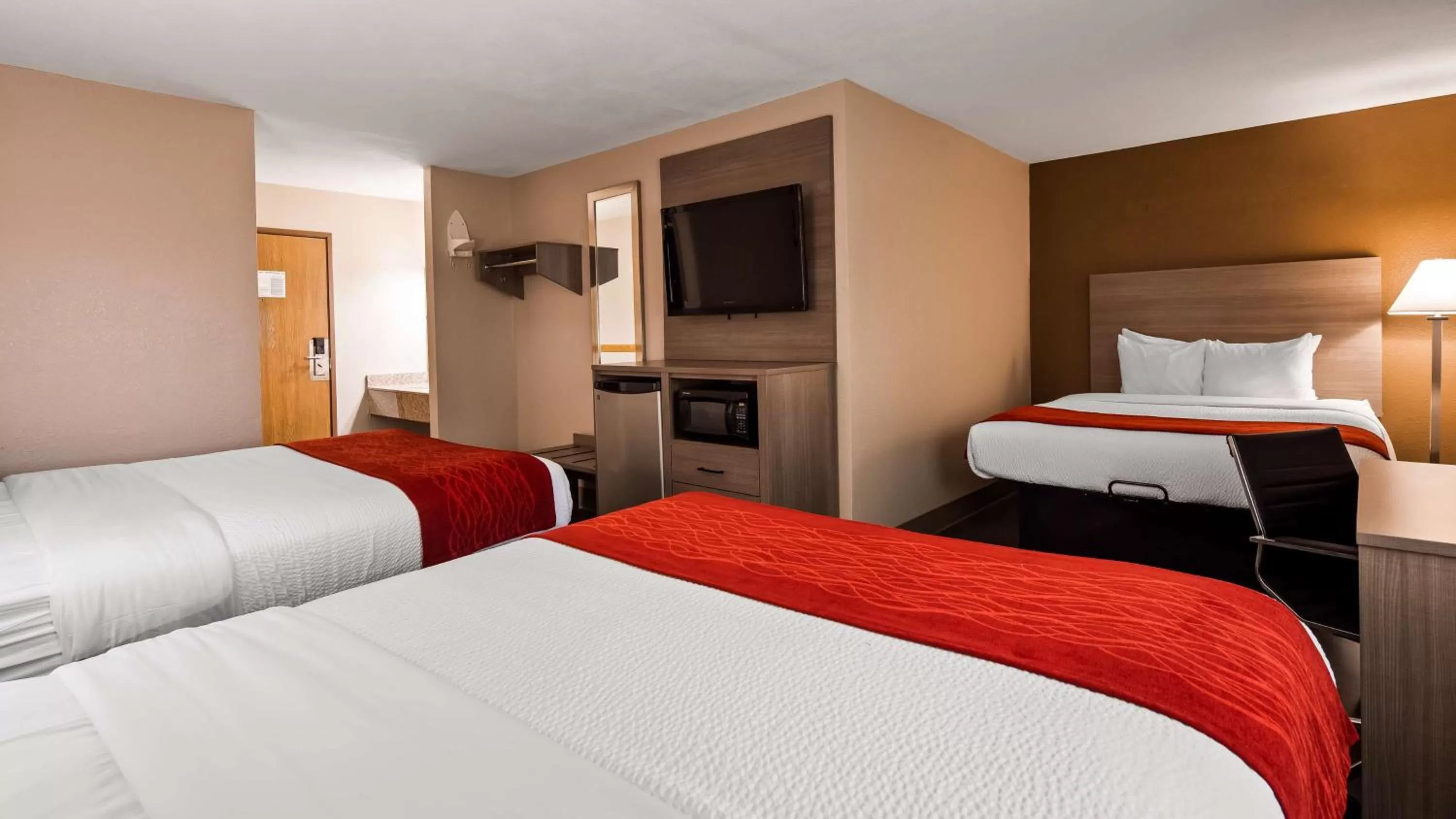 Queen Room with Three Queen Beds in SureStay Plus Hotel by Best Western Kearney