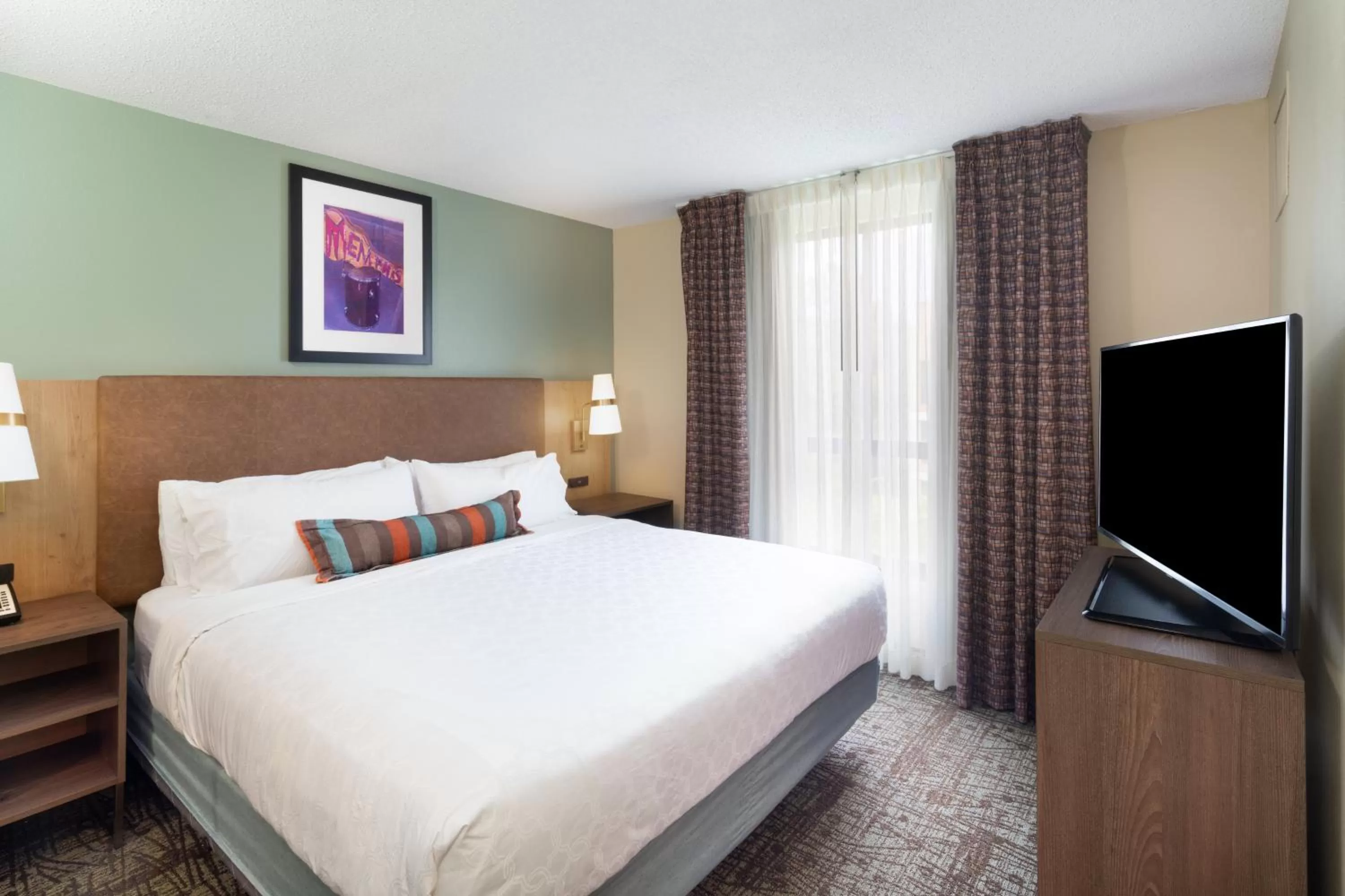 One-Bedroom King Suite with Communications Accessible Roll-In Shower in Staybridge Suites Memphis-Poplar Ave East, an IHG Hotel