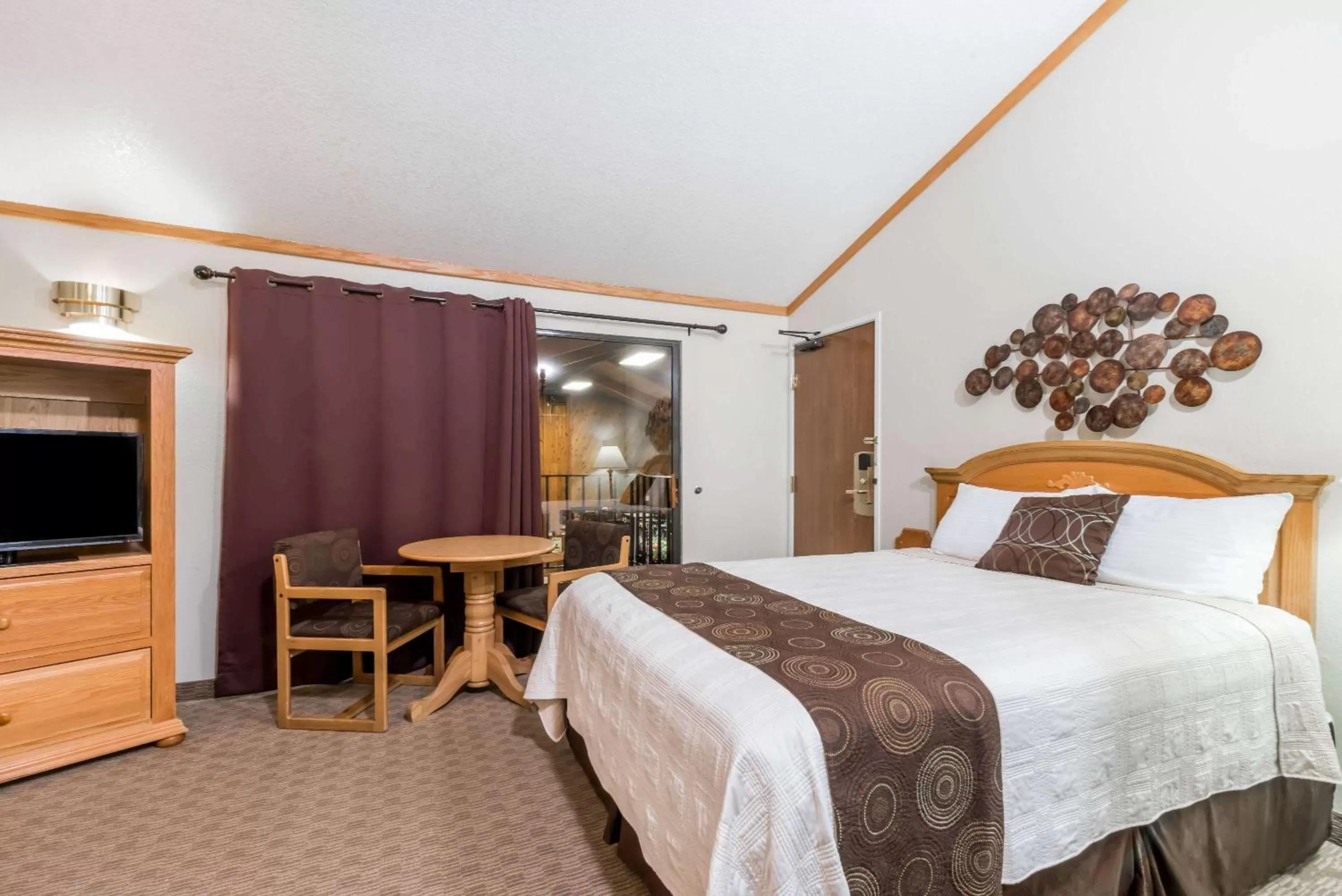 Deluxe Room with One King Bed and One Queen Bed - Non-Smoking - Pool View in Super 8 by Wyndham Deadwood Black Hills Area