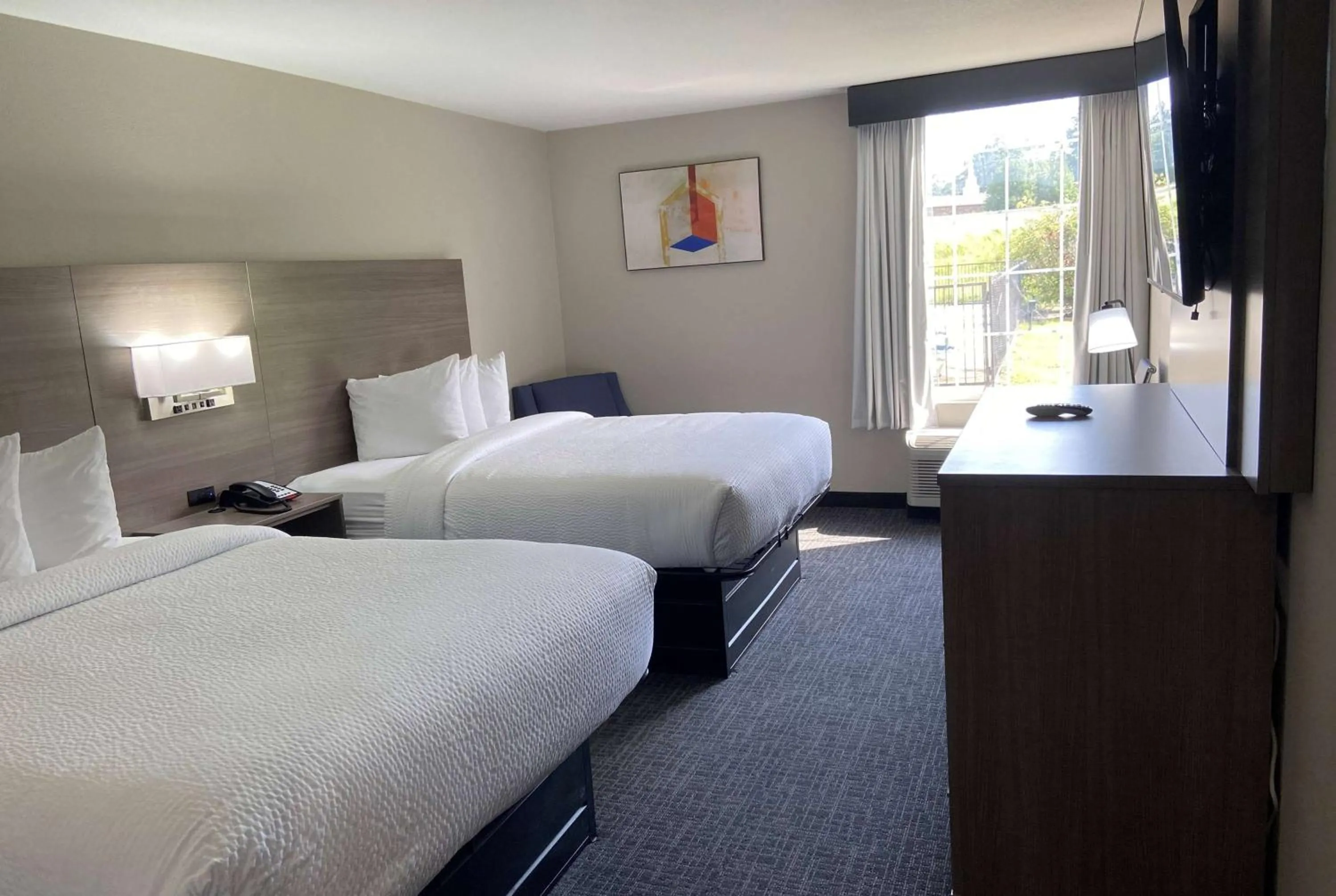 Queen Room with Two Queen Beds - Non-Smoking in Days Inn & Suites by Wyndham Tahlequah