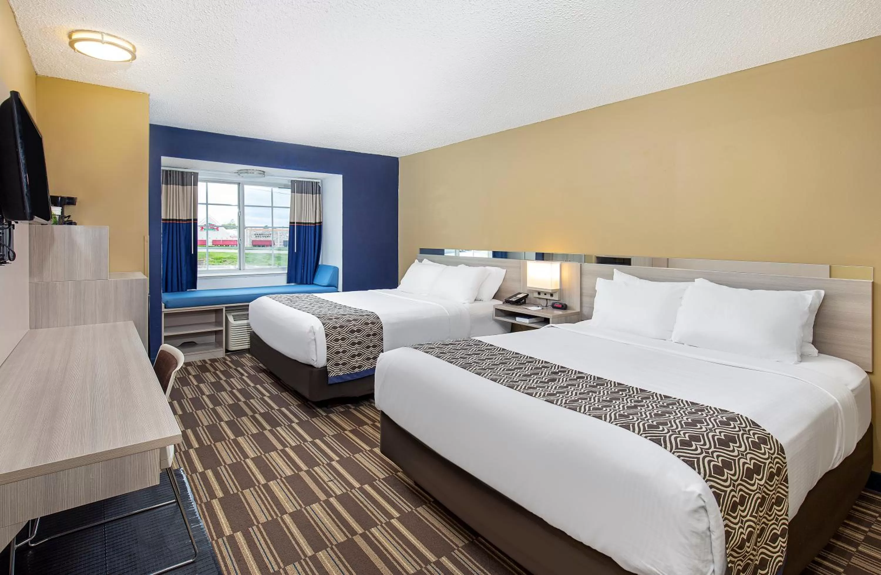 Queen Room with Two Queen Beds - Non-Smoking in Microtel Inn & Suites by Wyndham Dry Ridge