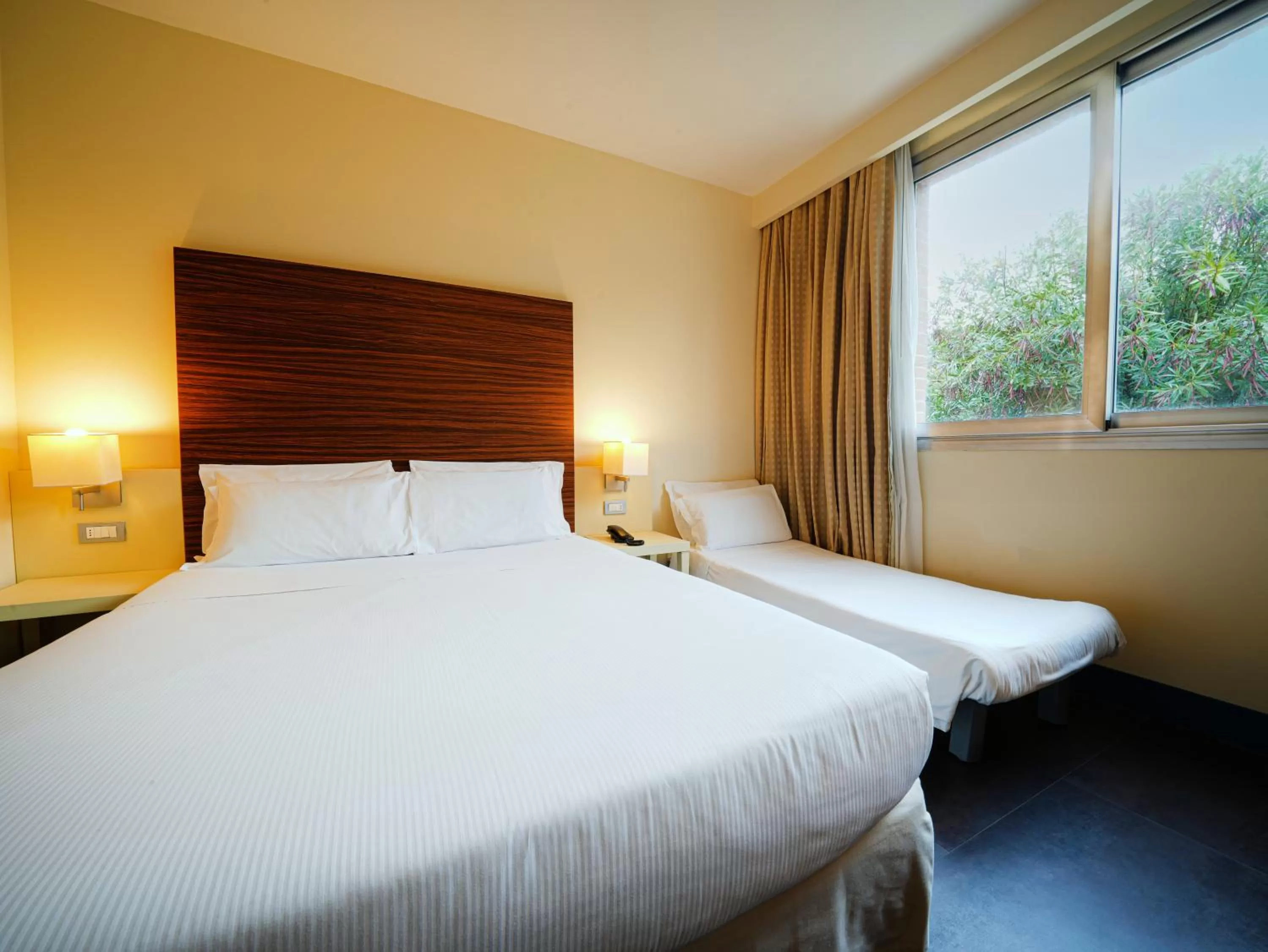 Comfort Triple Room in La Meridiana Bleisure Hotel