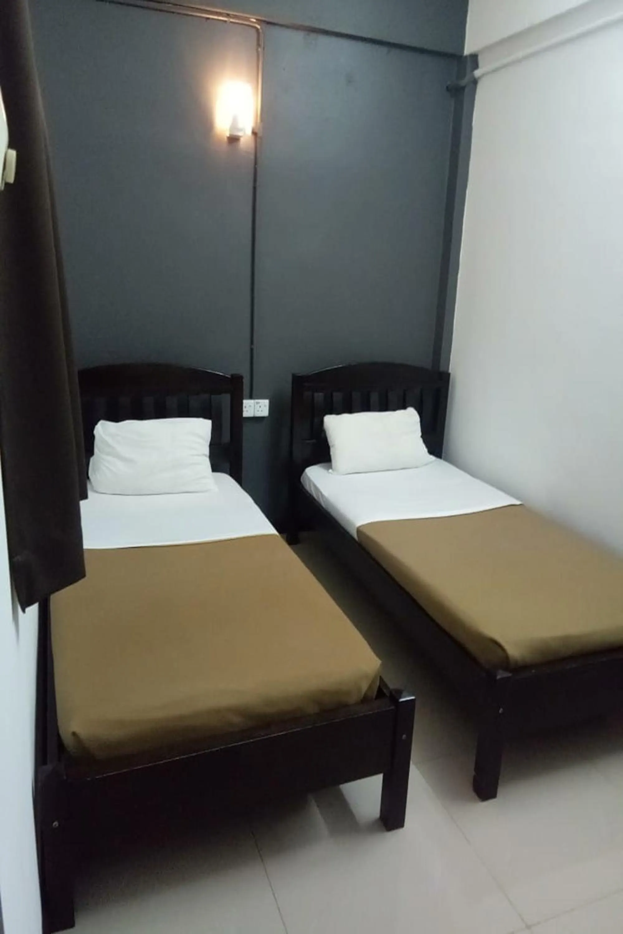 Standard Twin Room with Shared Bathroom in Uncle Guesthouse Kuala Terengganu