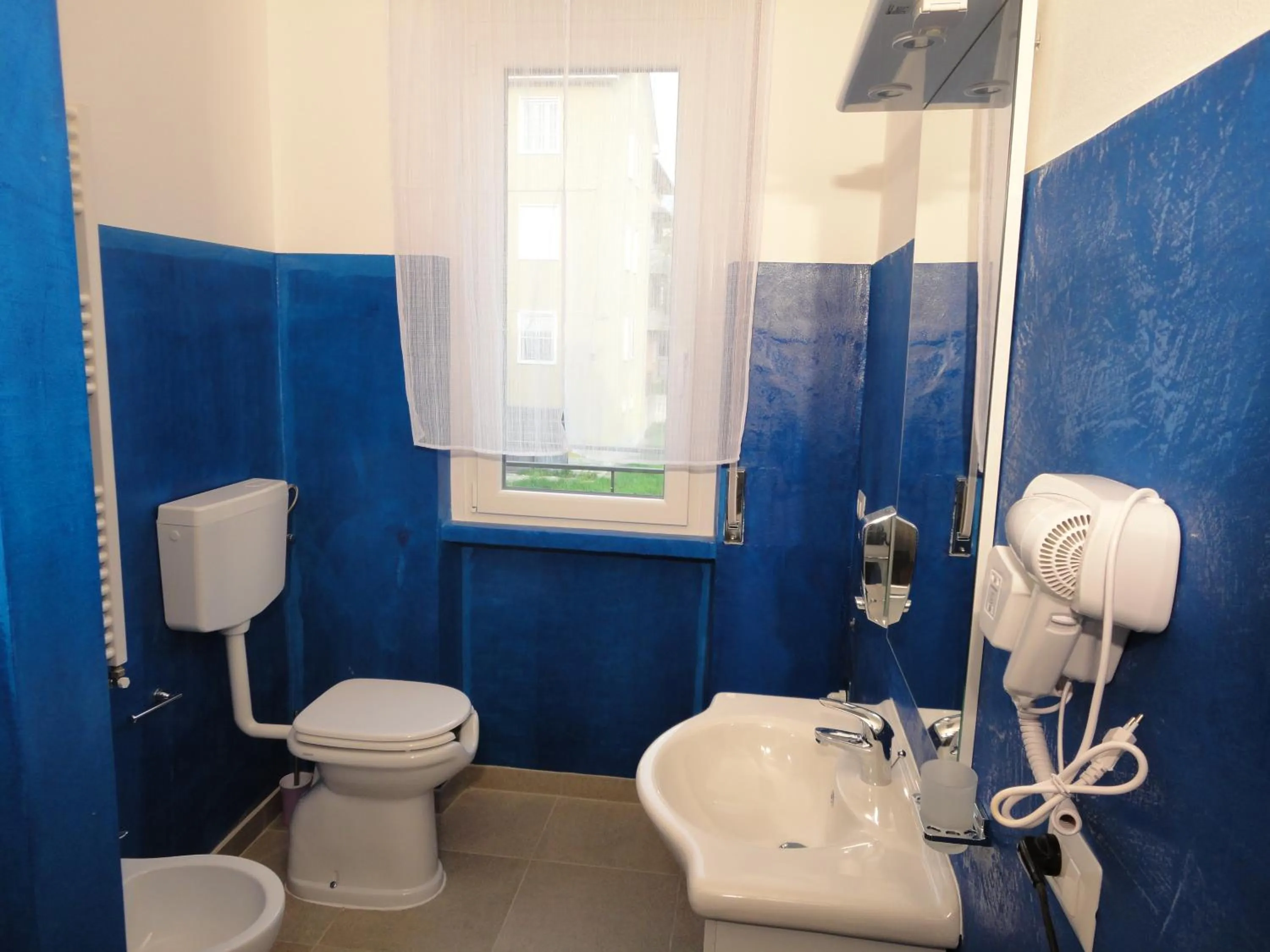 Quadruple Room with Private Bathroom - single occupancy in Pavia Ostello