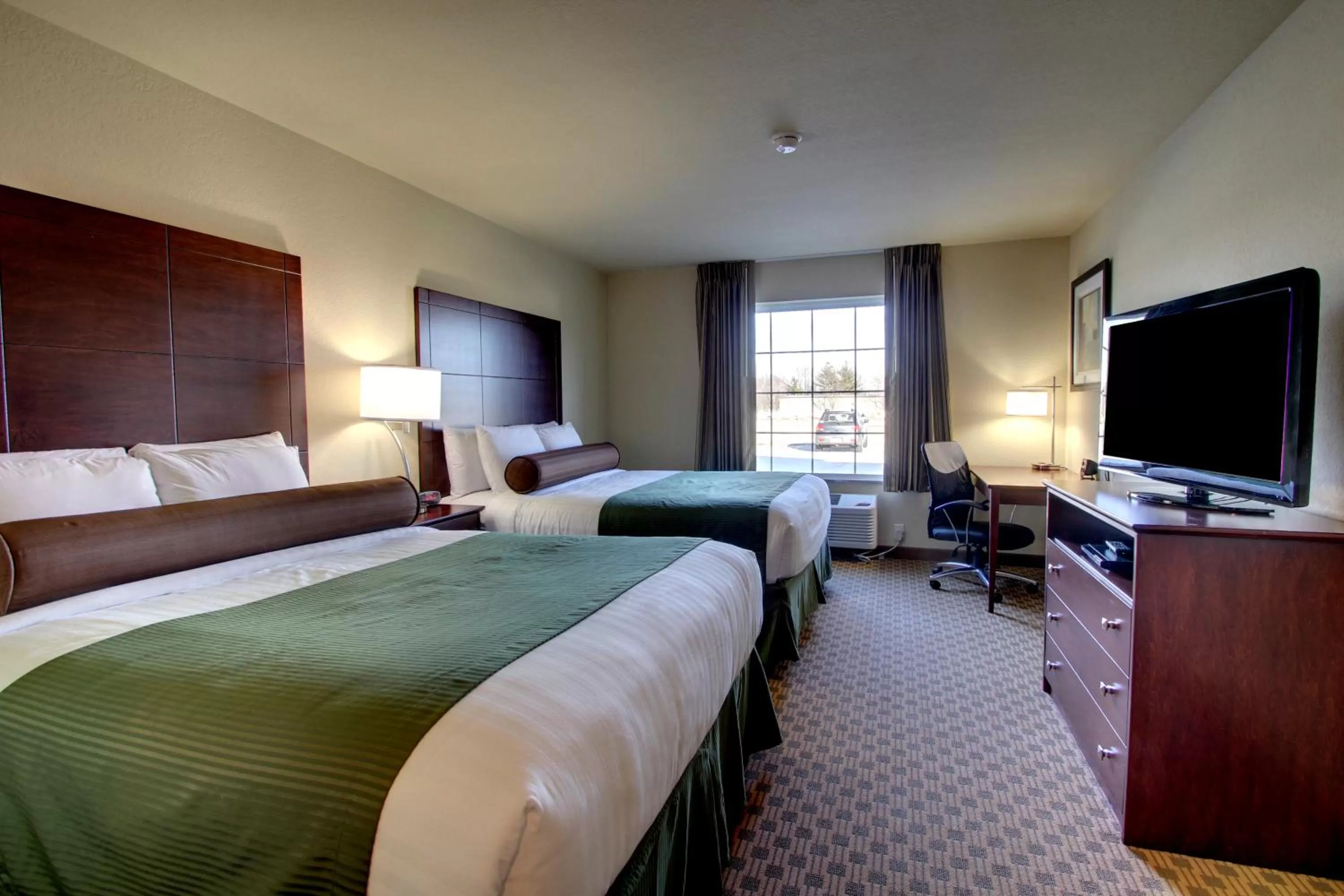 Queen Room with Two Queen Beds in Cobblestone Inn & Suites - Rugby