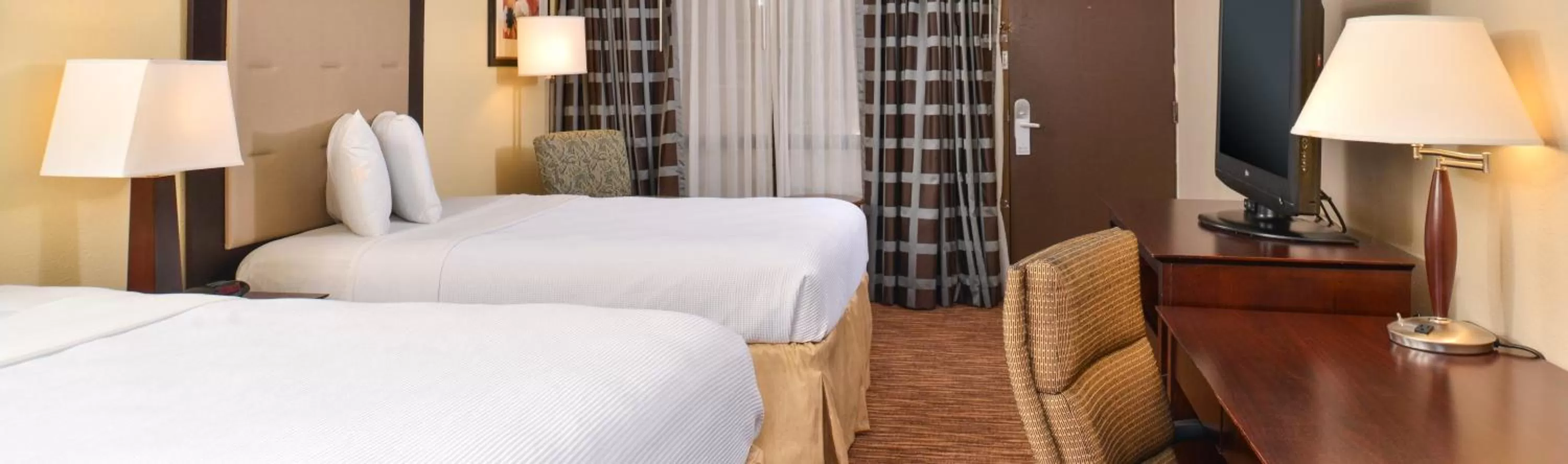 Quadruple Room with Two Queen Beds - Disability Access/Non Smoking in Rodeway Inn Abilene West