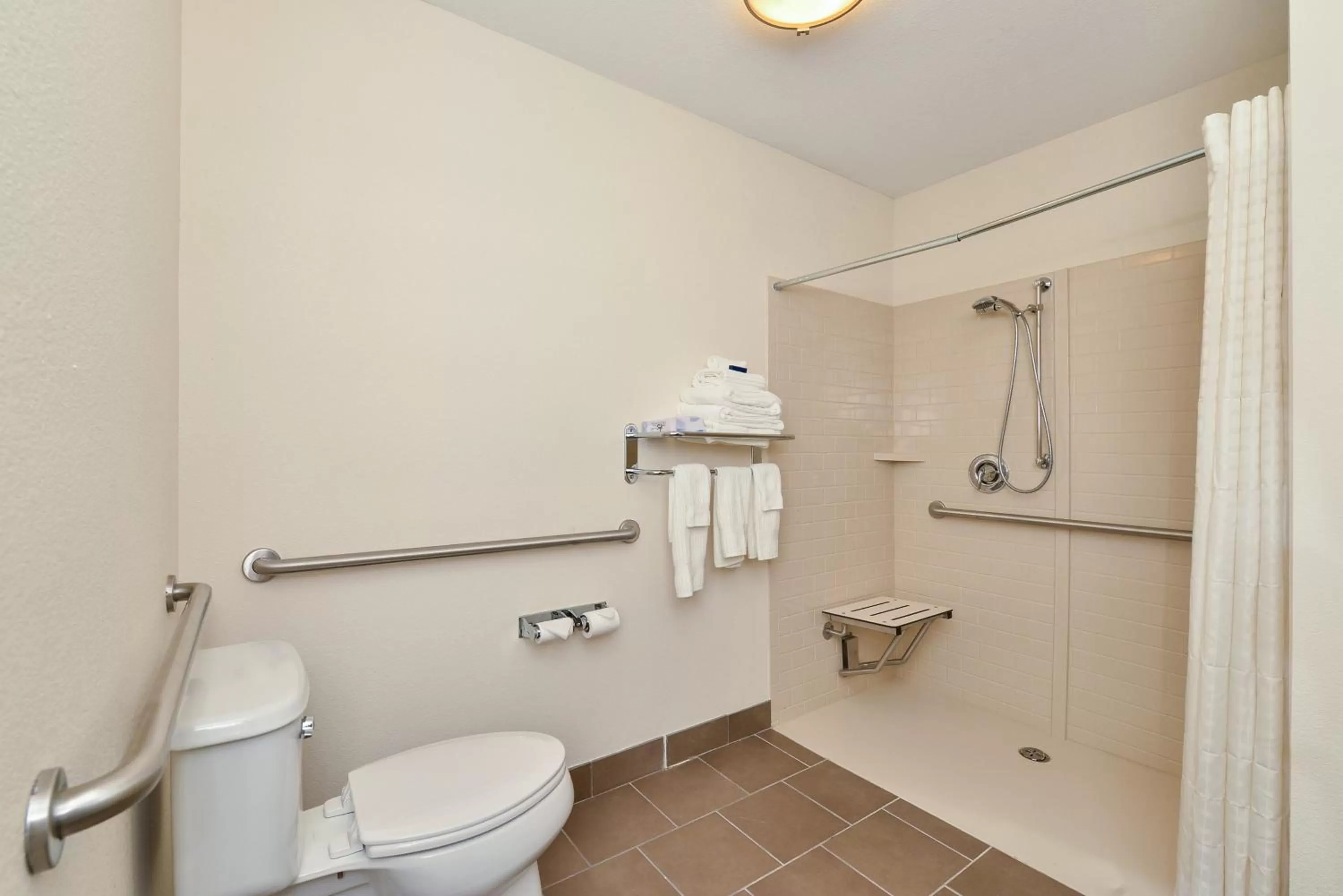 King Room with Roll-In Shower - Disability Access in Candlewood Suites Monahans by IHG