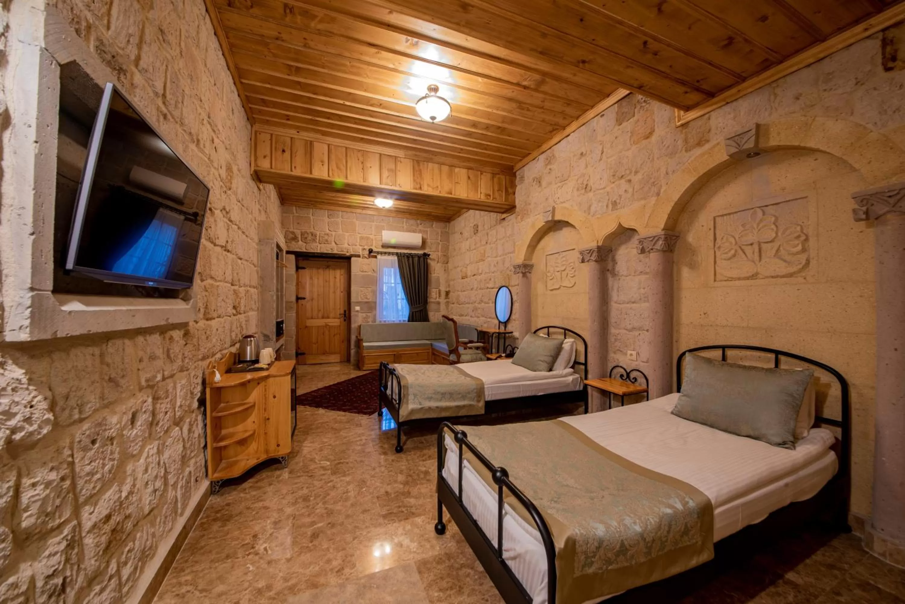 Stone Twin Room with Garden View in Cratus Stone Palace