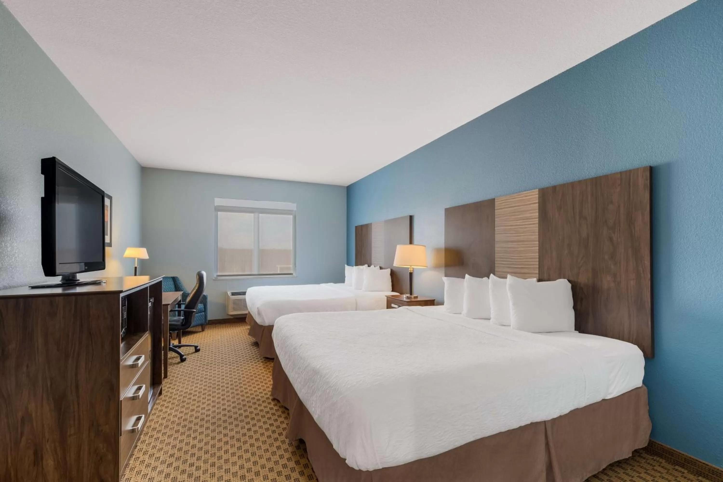 King Room with Two King Beds - Smoking in Best Western South Plains Inn & Suites