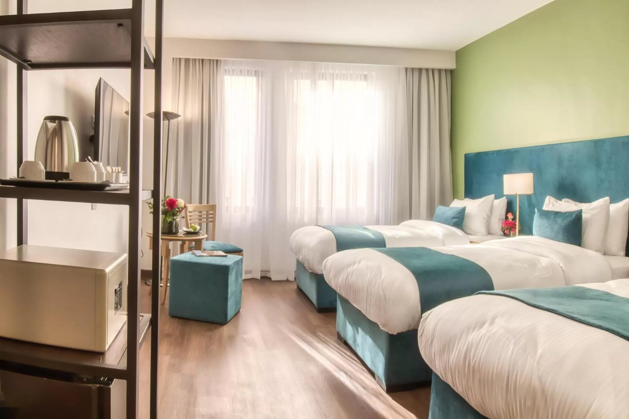 Standard Triple Room in The Liwan Hotel