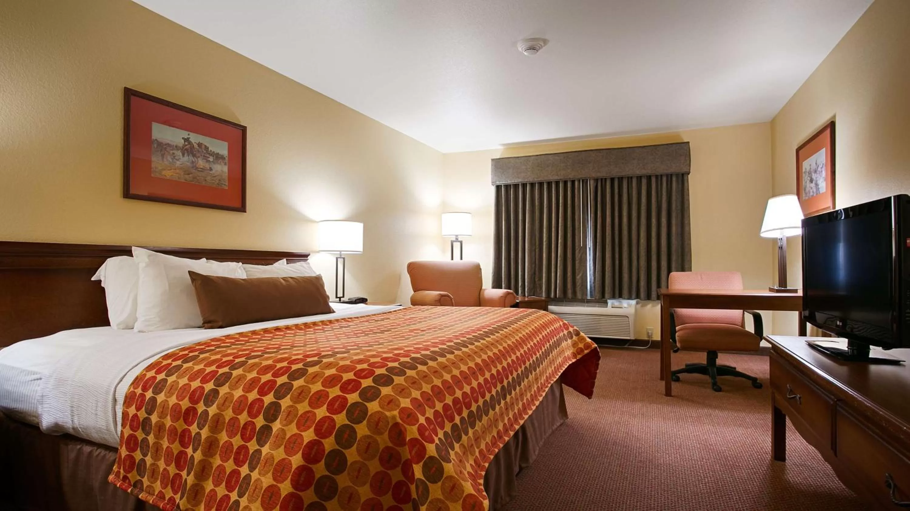King Room with Roll-In Shower - Disability Access in SureStay Plus Hotel by Best Western Coffeyville