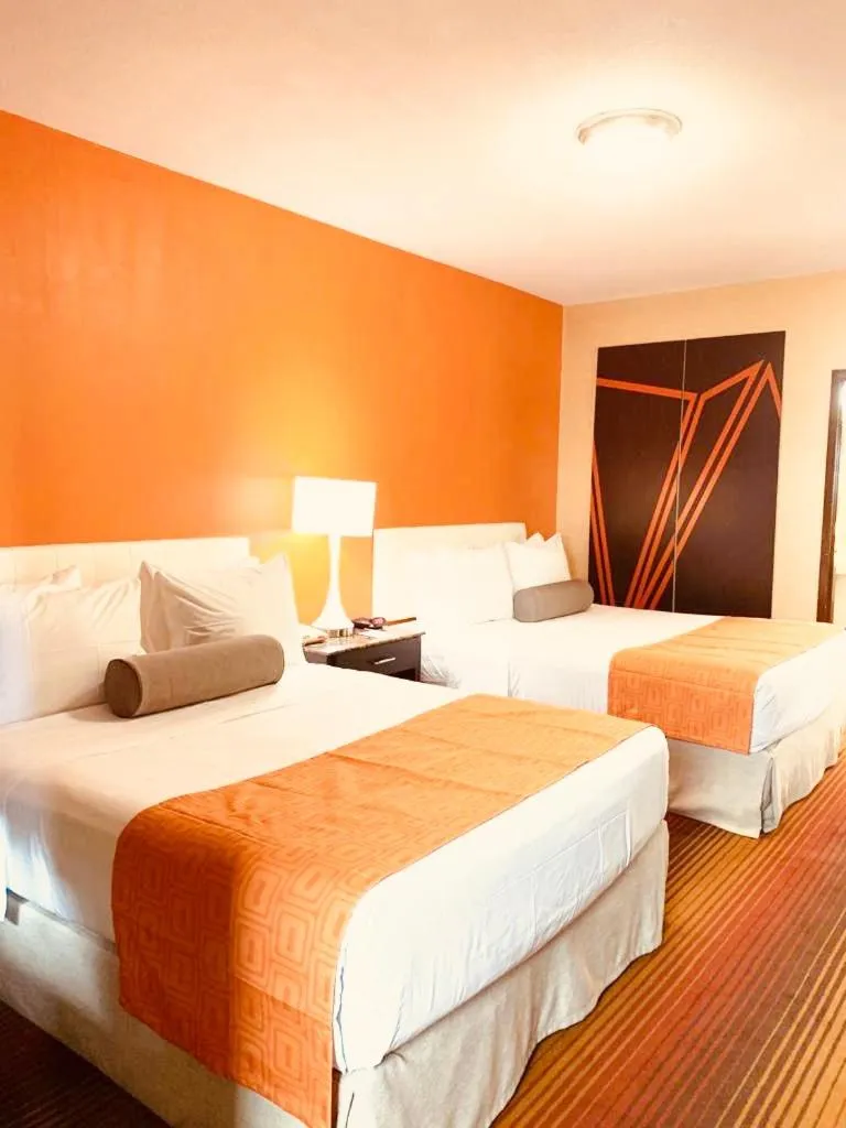 Queen Room with Two Queen Beds - Smoking in Howard Johnson by Wyndham North Bergen