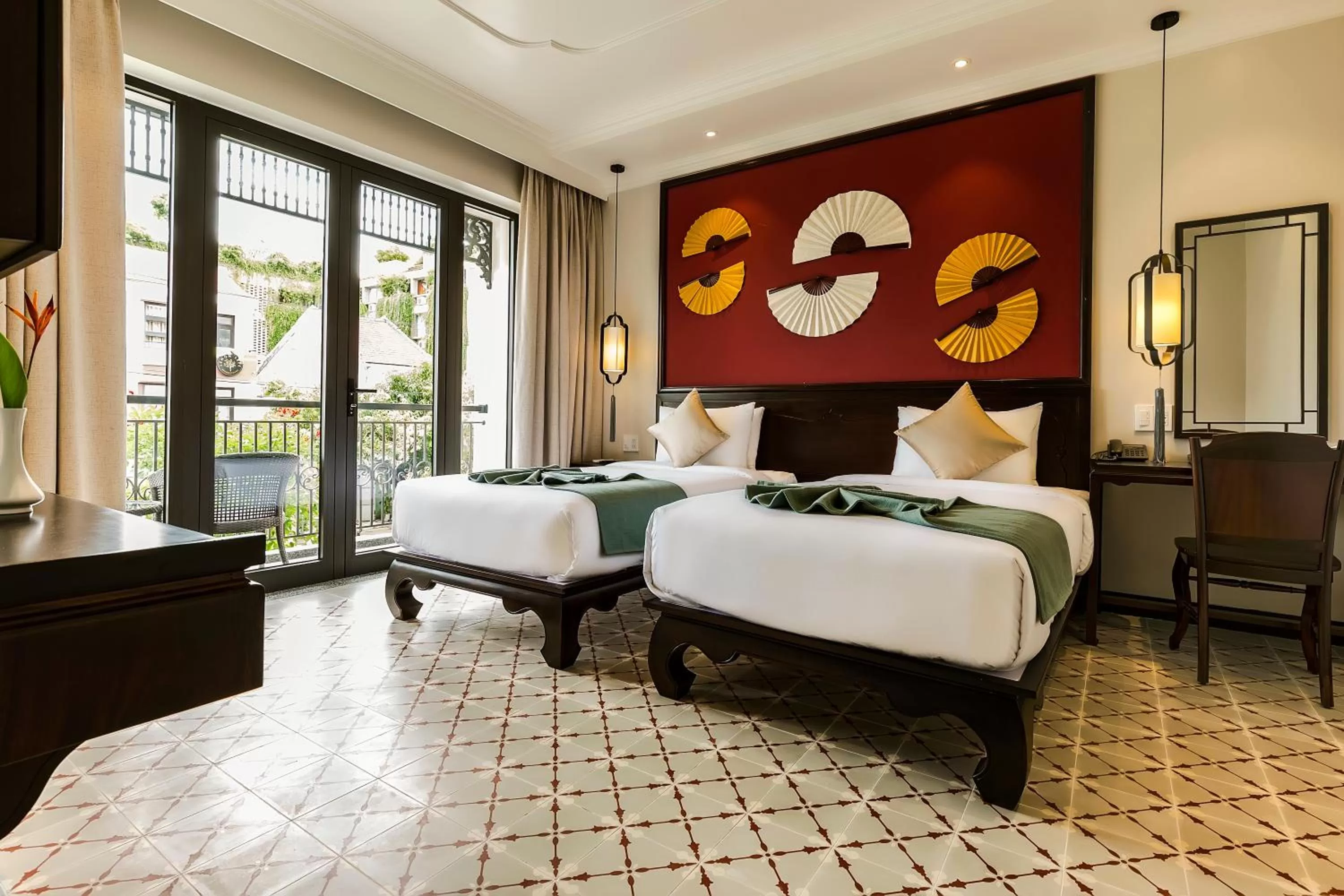 Family Connecting Room with Balcony and Pool View in Laluna Hoi An Riverside Hotel & Spa