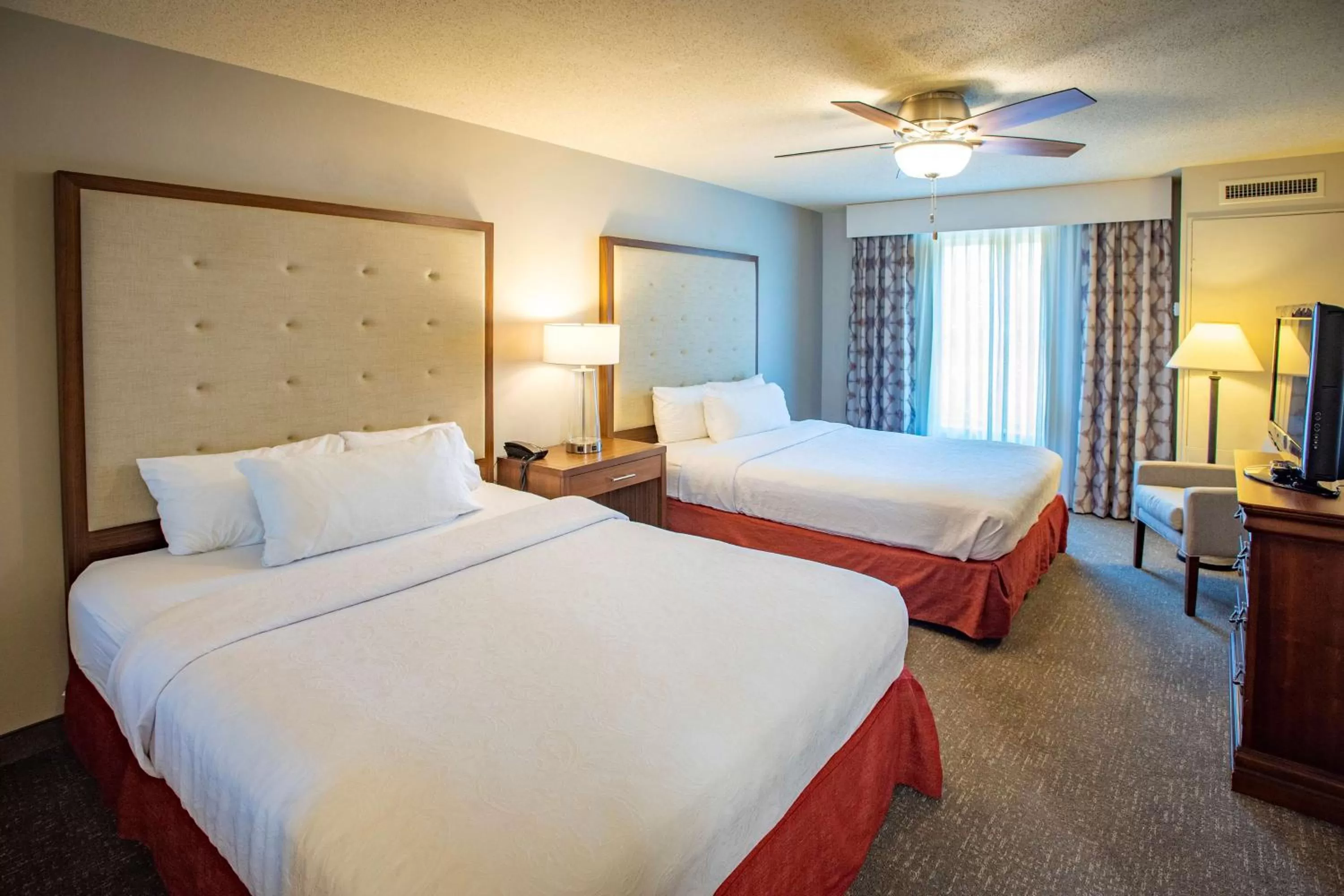 Suite with One King Bed and Two Queen Beds - Non-Smoking in Pensacola Suites Hotel