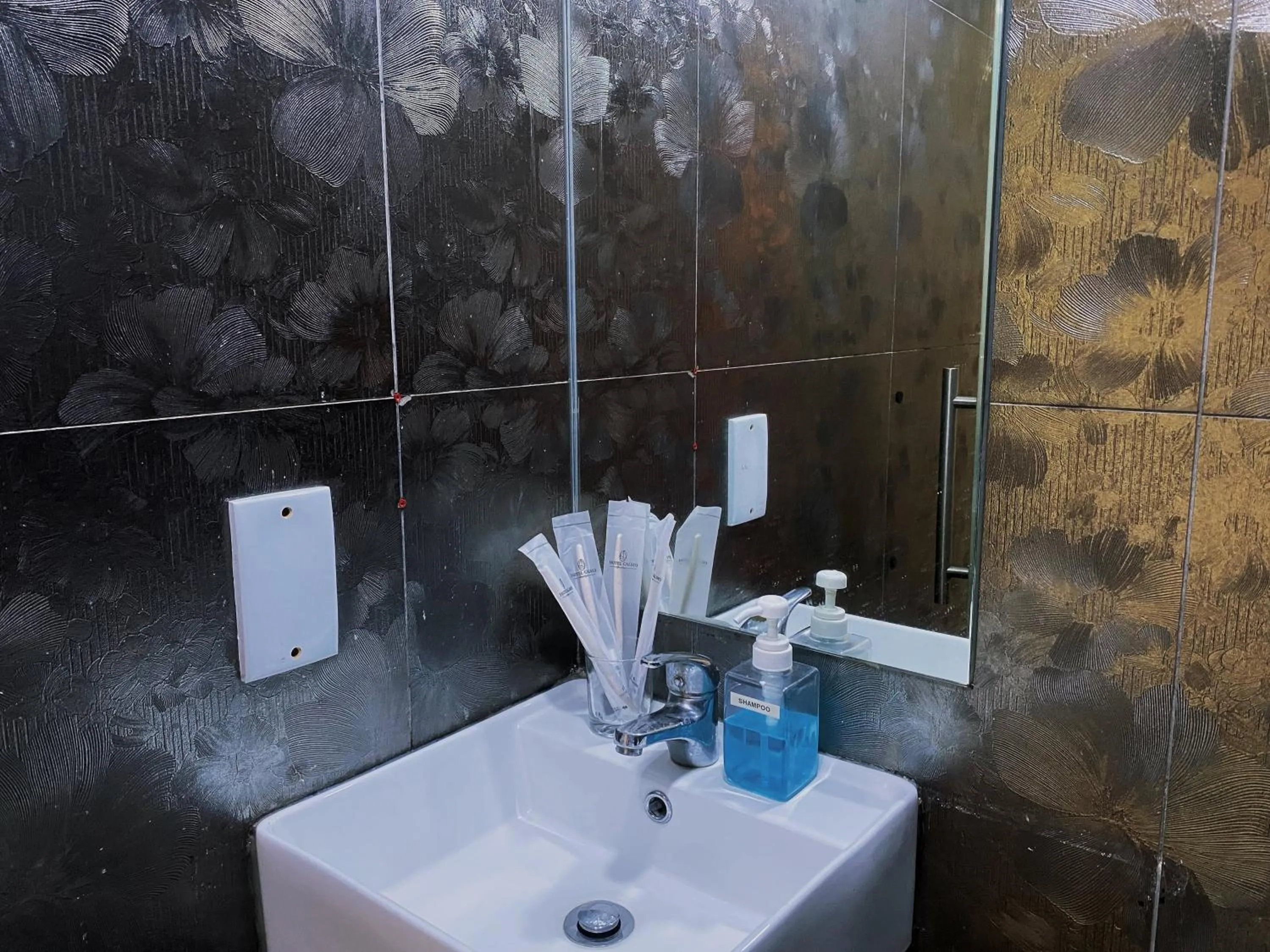 Deluxe Quadruple Room in Hotel Calmo Chinatown