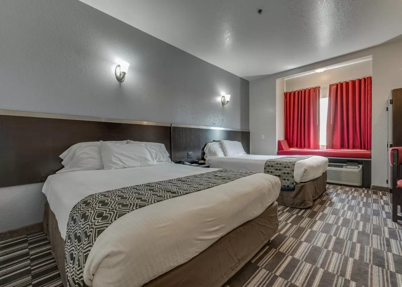 Queen Room with Two Queen Beds - Non-Smoking in Microtel Inn & Suites by Wyndham Oklahoma City Airport