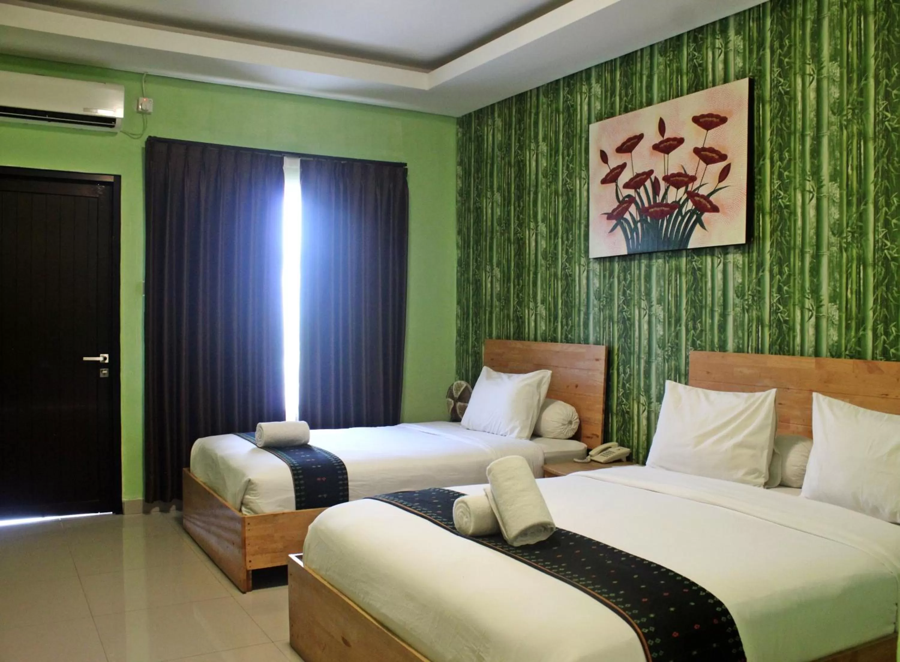 Deluxe Triple Room - Free Return Airport Transfer in Exotic Komodo Hotel