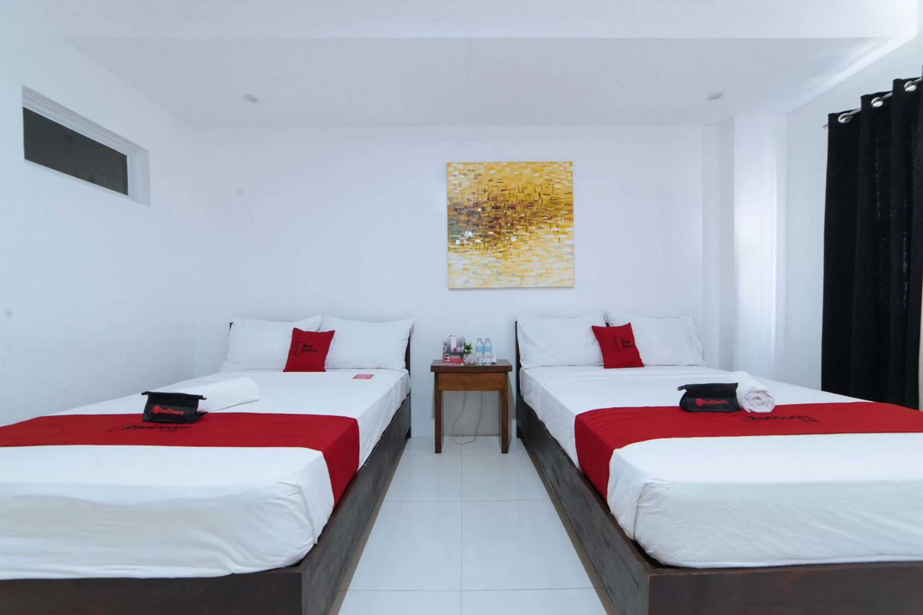 Deluxe Triple Room in RedDoorz Plus @ San Roque Roxas City