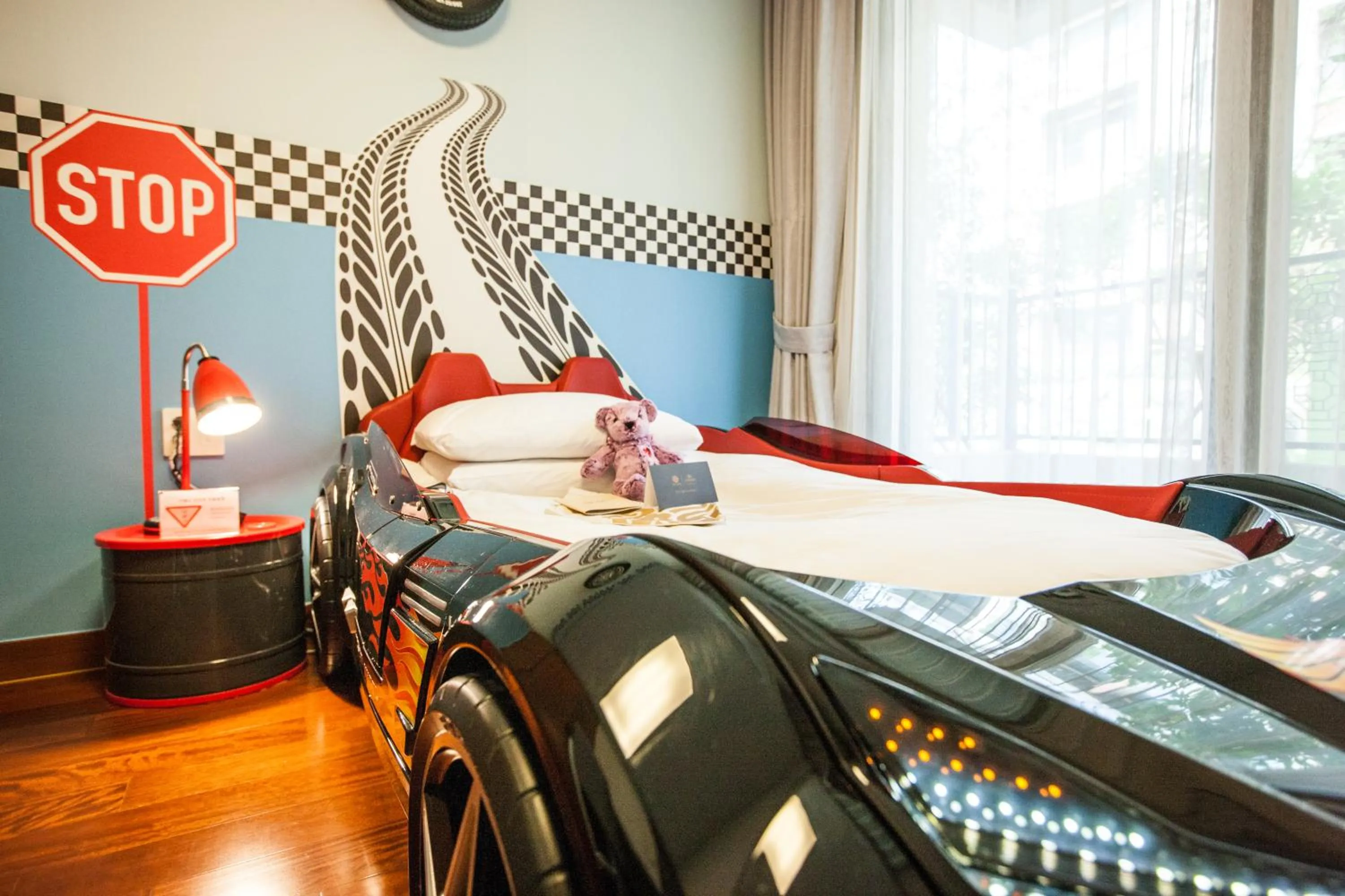 Three-Bedroom Apartment with Kids Racing Car Bed in Somerset Jeju Shinhwa World