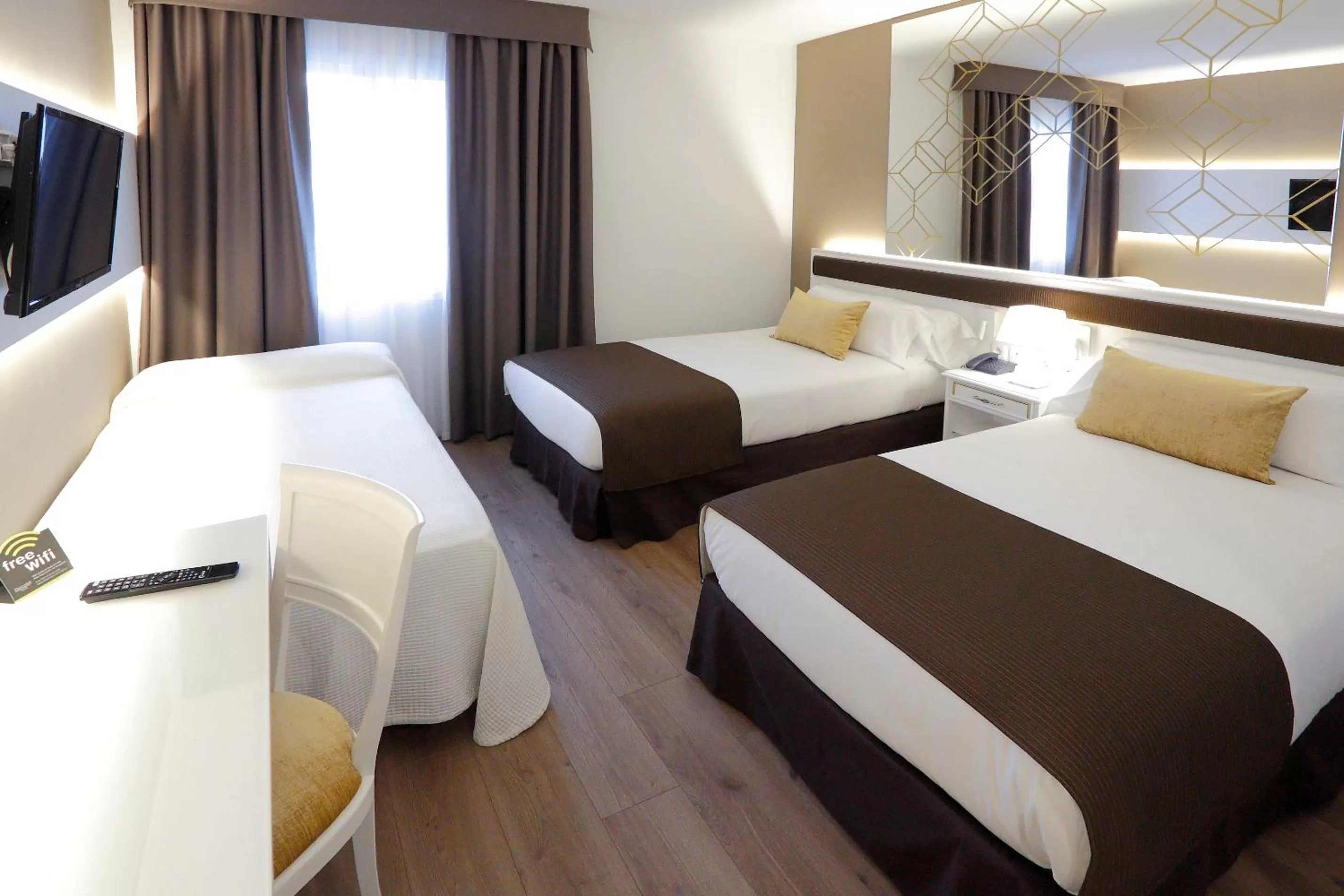 Triple Room in Sercotel Alfonso XIII