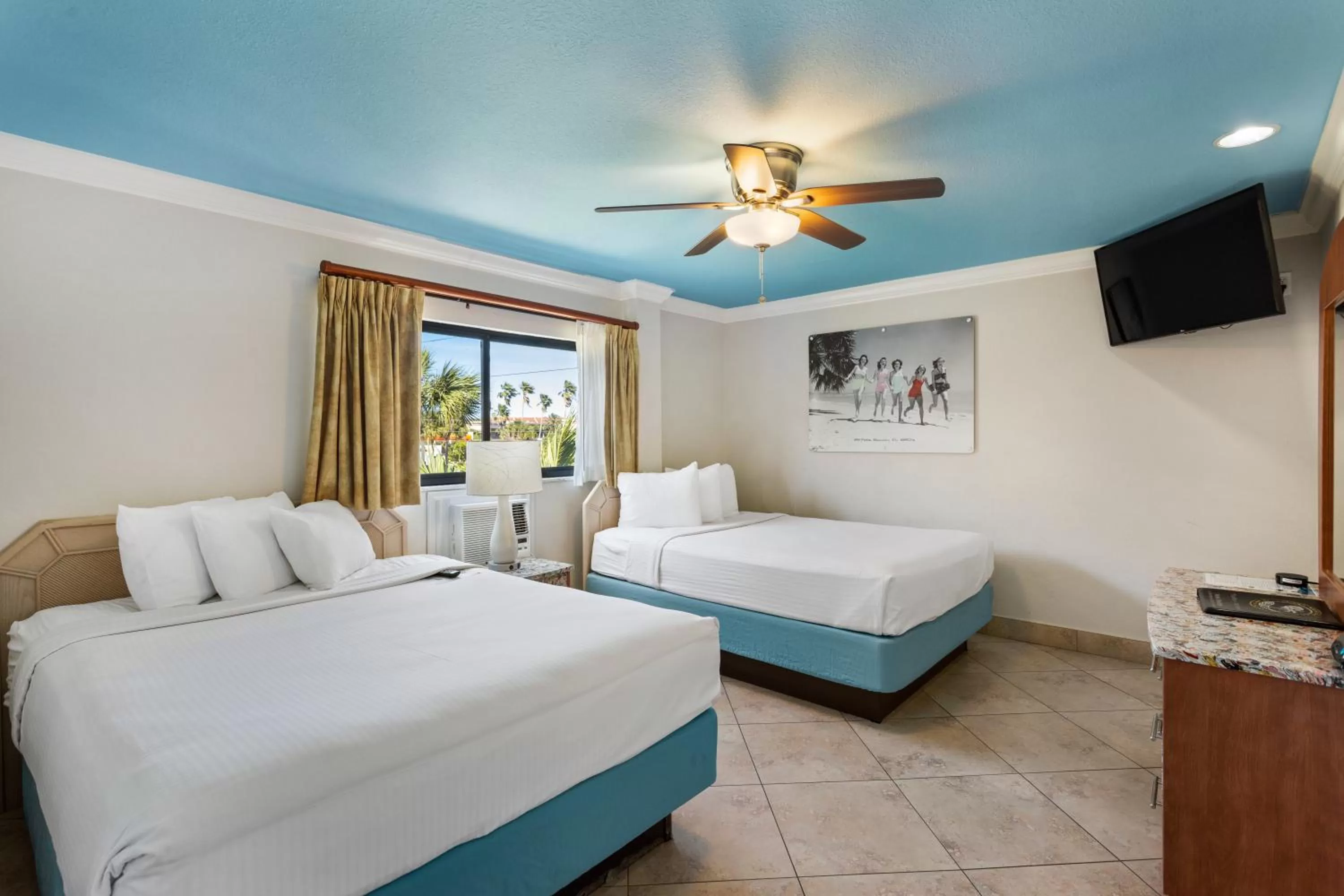 Deluxe One Bedroom Suite: 2 Queen Beds in Bedroom and 1 Sleeper Sofa in Plaza Beach Hotel - Beachfront Resort
