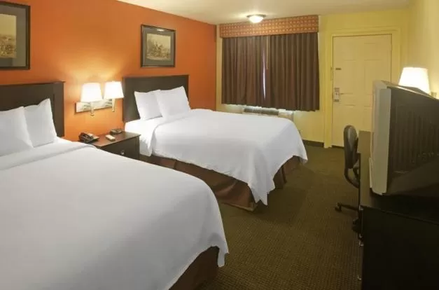 Queen Room with Two Queen Beds - Non-Smoking in Americas Best Value Inn Waco - Franklin Avenue