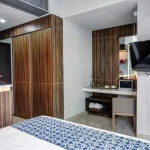 Deluxe Double Room in Sampit Residence Managed by FLAT06