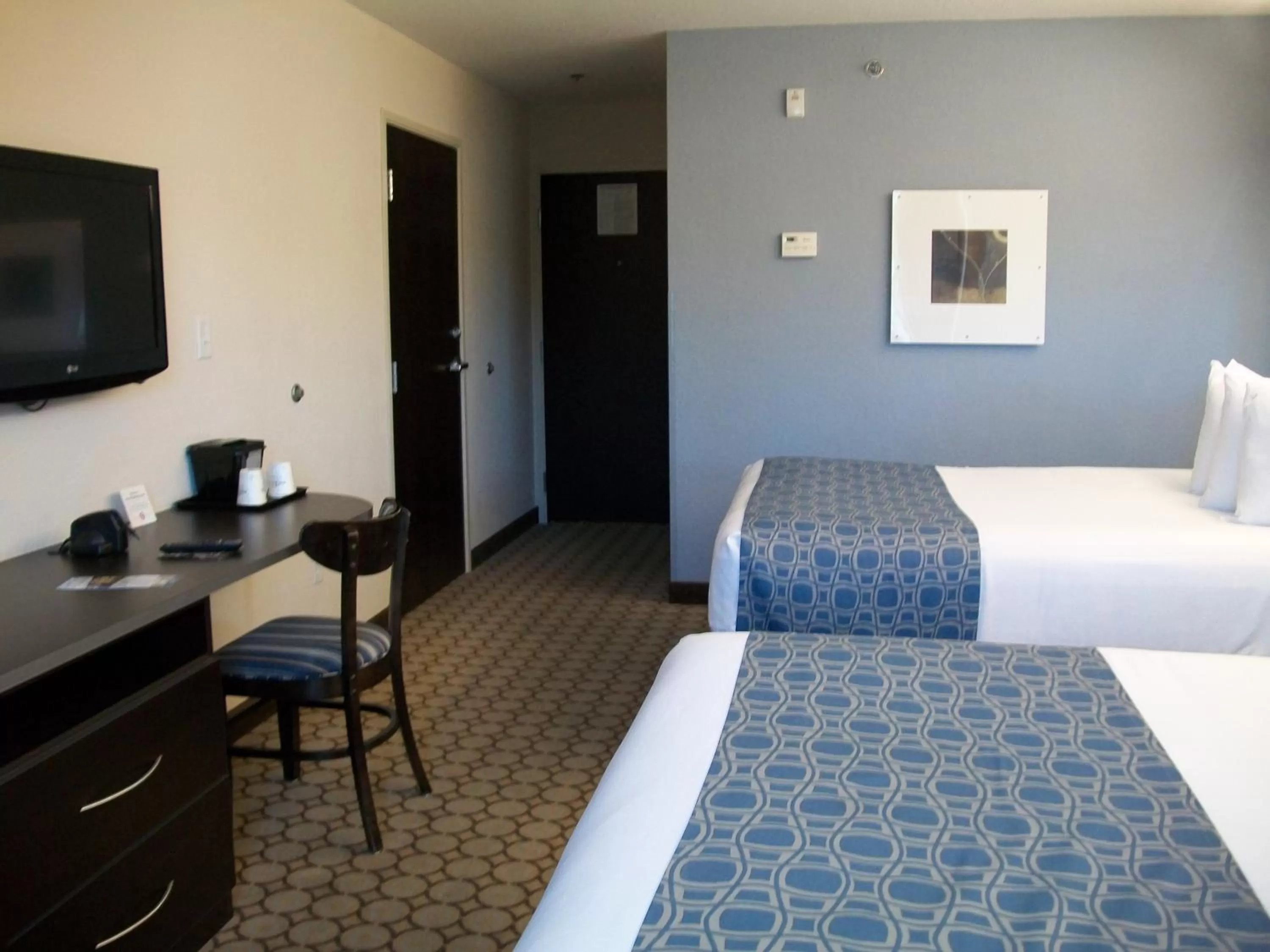 Queen Room with Two Queen Beds - Non-Smoking in Microtel Inn & Suites by Wyndham Spring Hill/Weeki Wachee