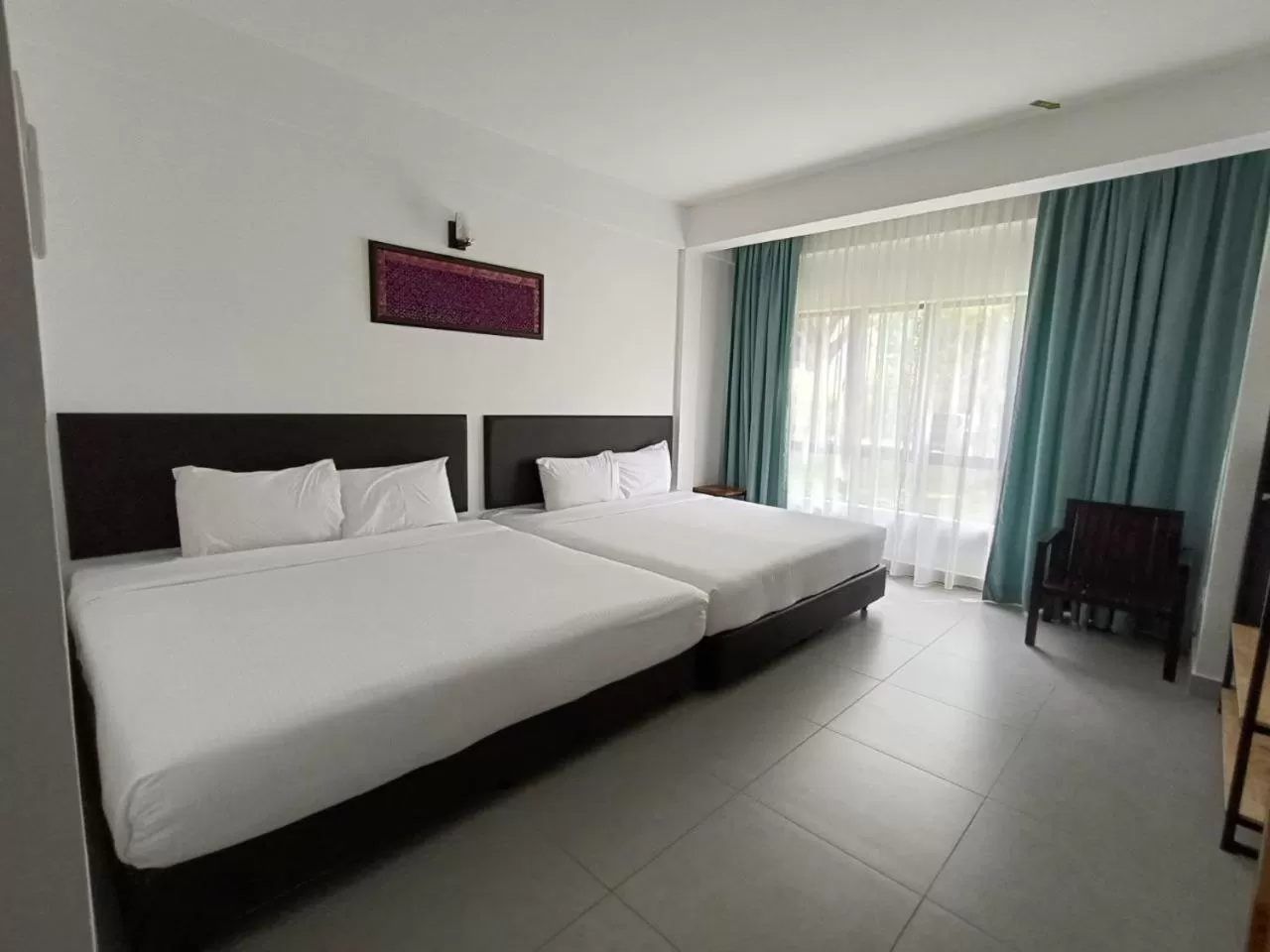 Deluxe Quad Garden View in ēRYA by SURIA Hot Spring Bentong