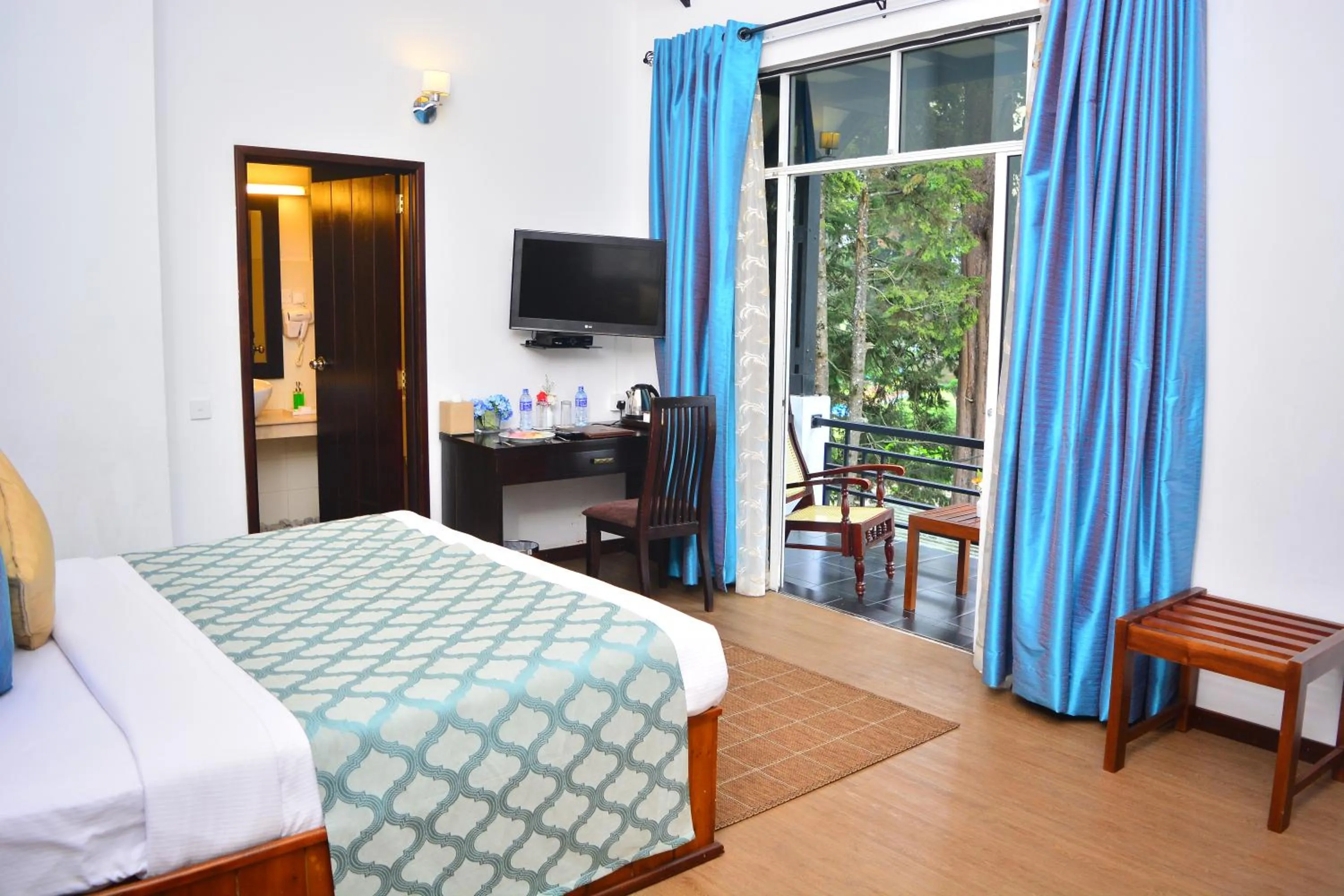 Double Room with Balcony (2 Adults + 1 Child) in Unique Cottages