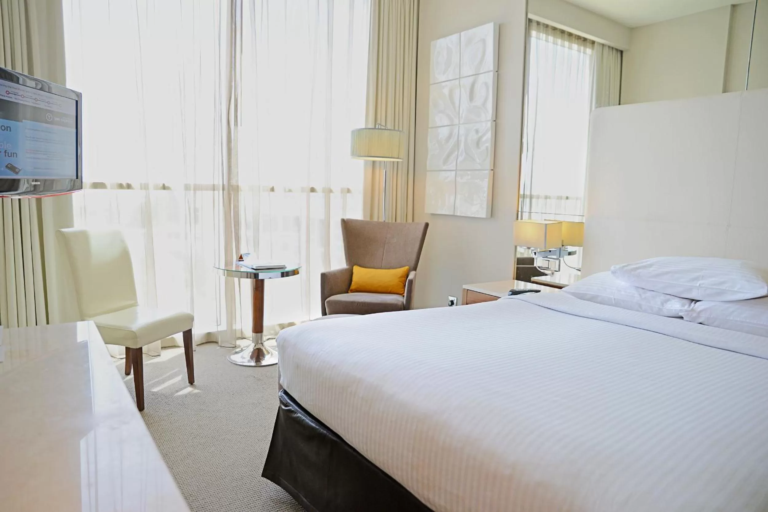Centro Room Pool View – Queen Bed with Free Beach Access in Centro Yas Island-by Rotana