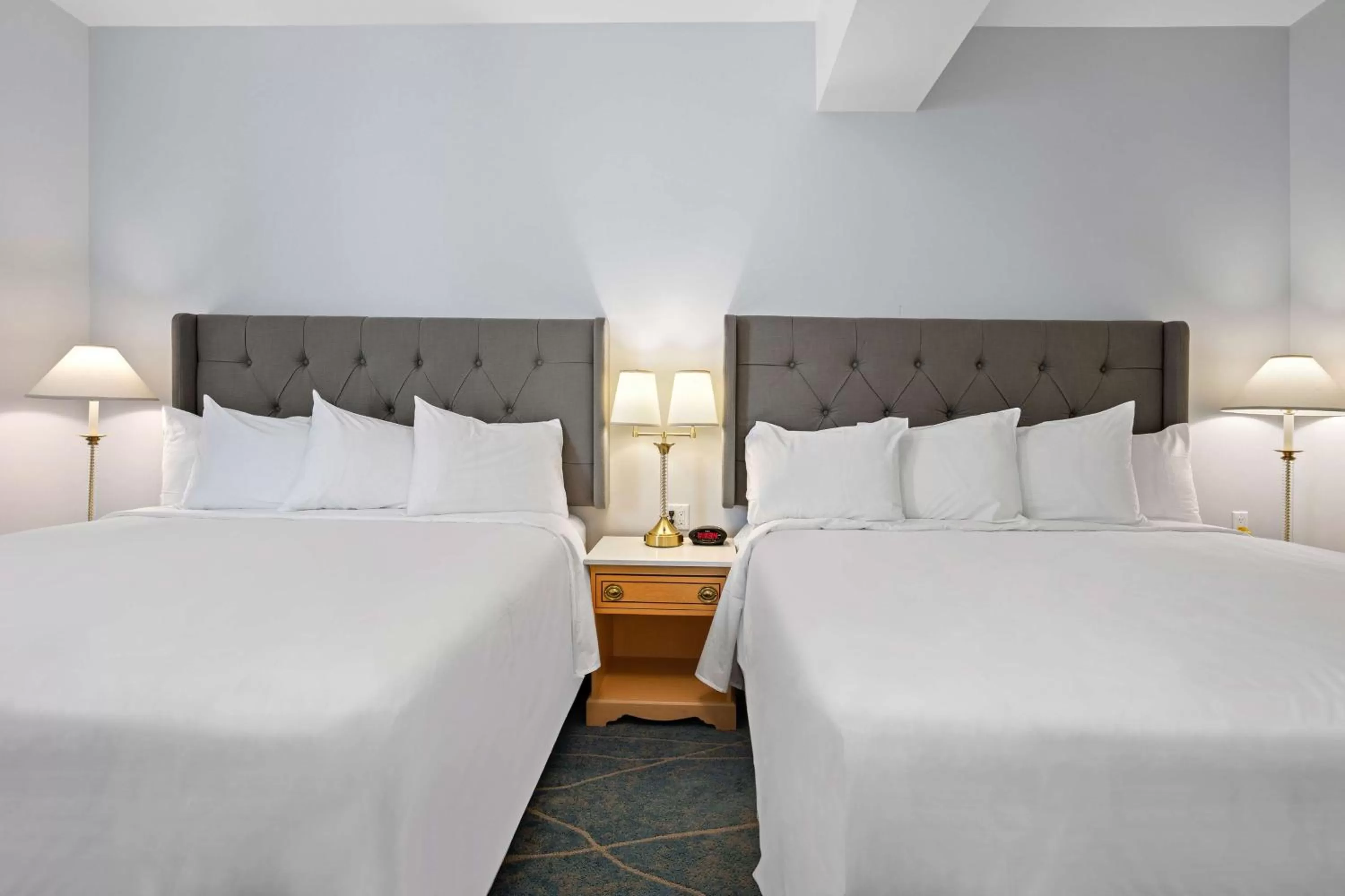 King Suite with Two King Beds and Living Room in Crown Columbia Hotel; BW Premier Collection