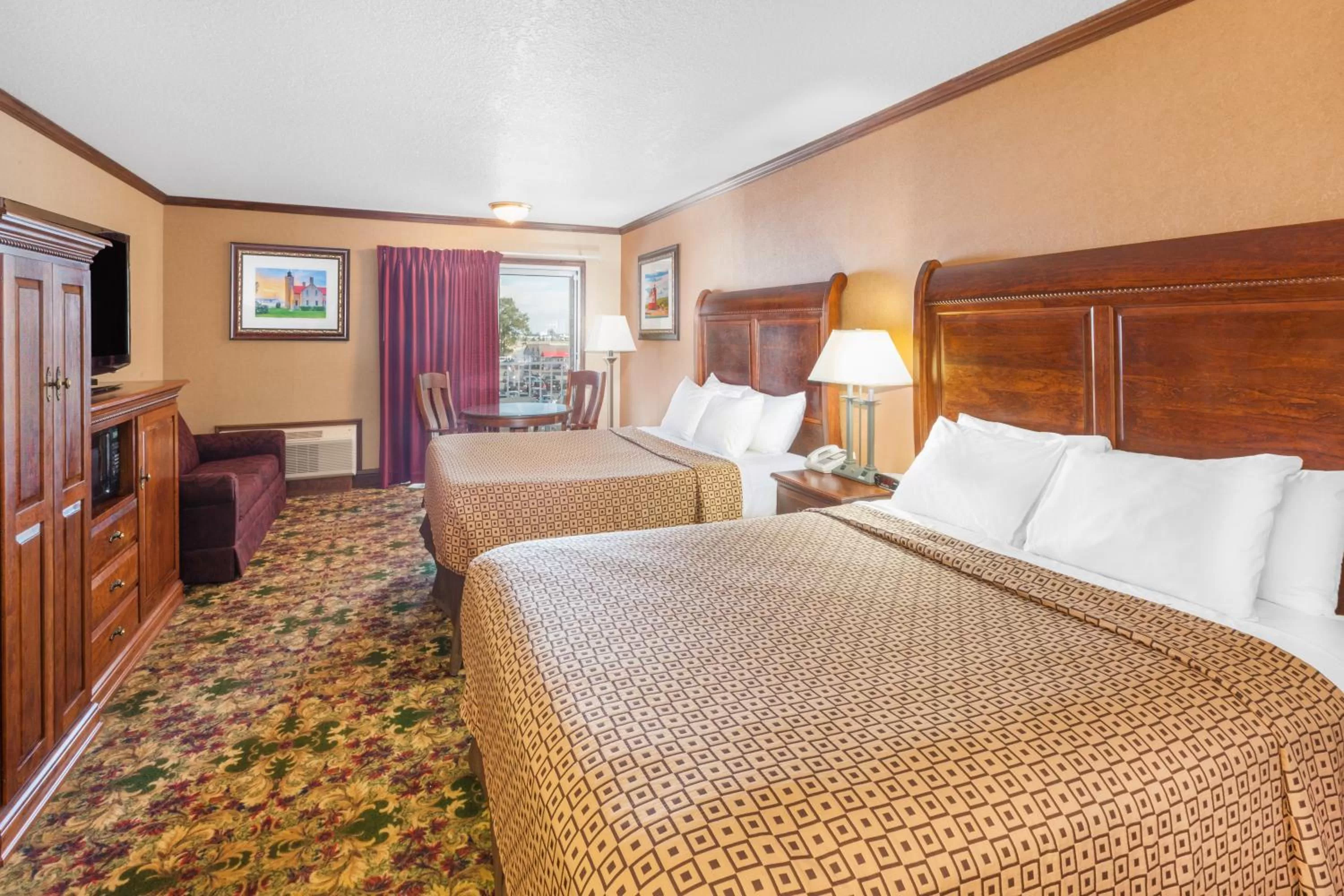 Queen Room with Two Queen Beds - Non-Smoking in Ramada by Wyndham Mackinaw City Waterfront