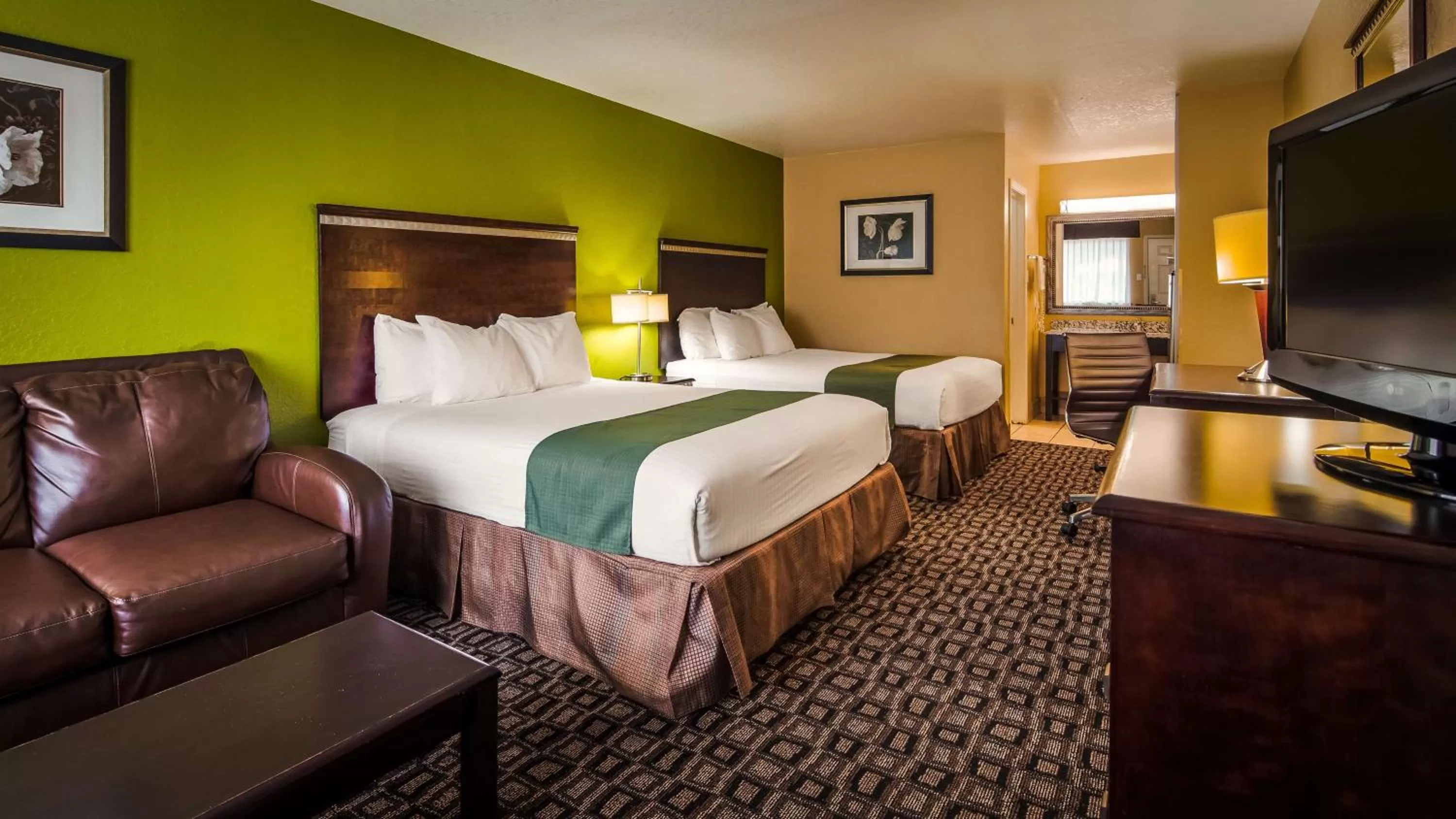 Queen Room with Two Queen Beds - Smoking in SureStay Hotel by Best Western Floresville