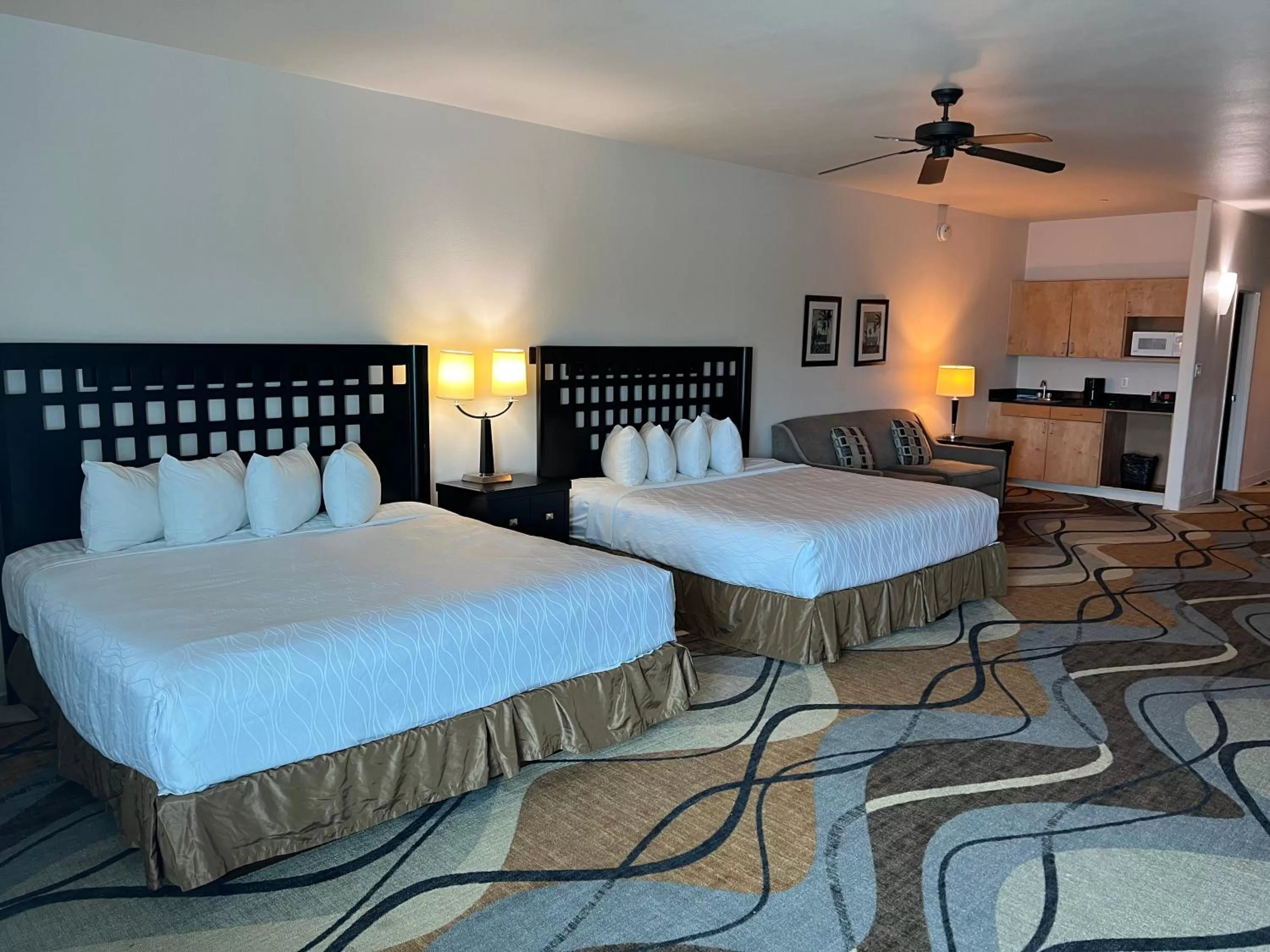 King Suite with Two King Beds and Sofa Bed  in Sunchase Inn & Suites