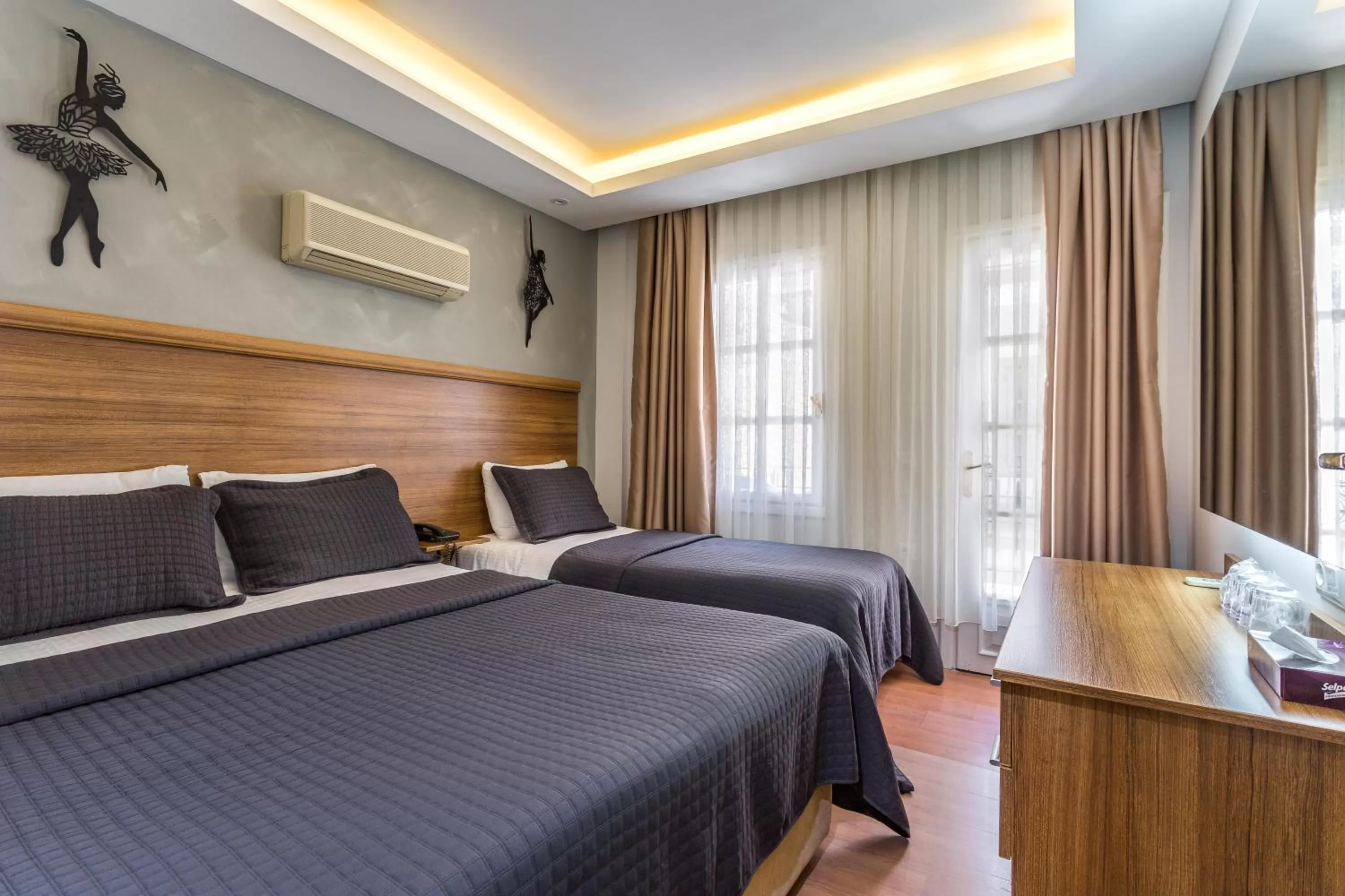 Standard Triple Room in Aqua Princess Hotel