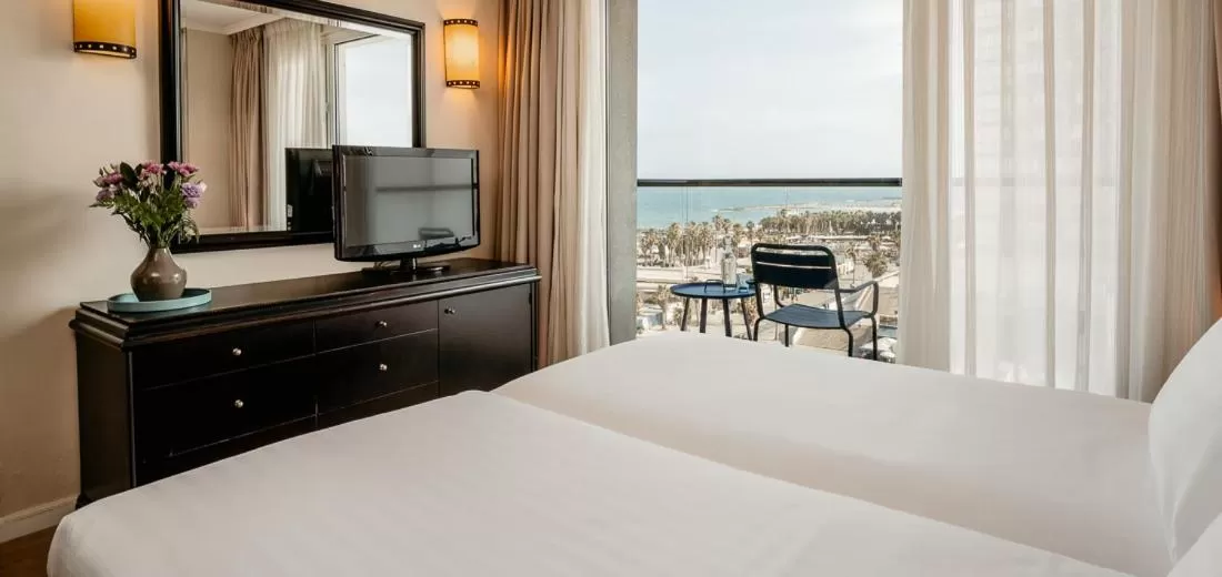 Junior King Suite - Lounge Access in Crowne Plaza Tel Aviv Beach by IHG