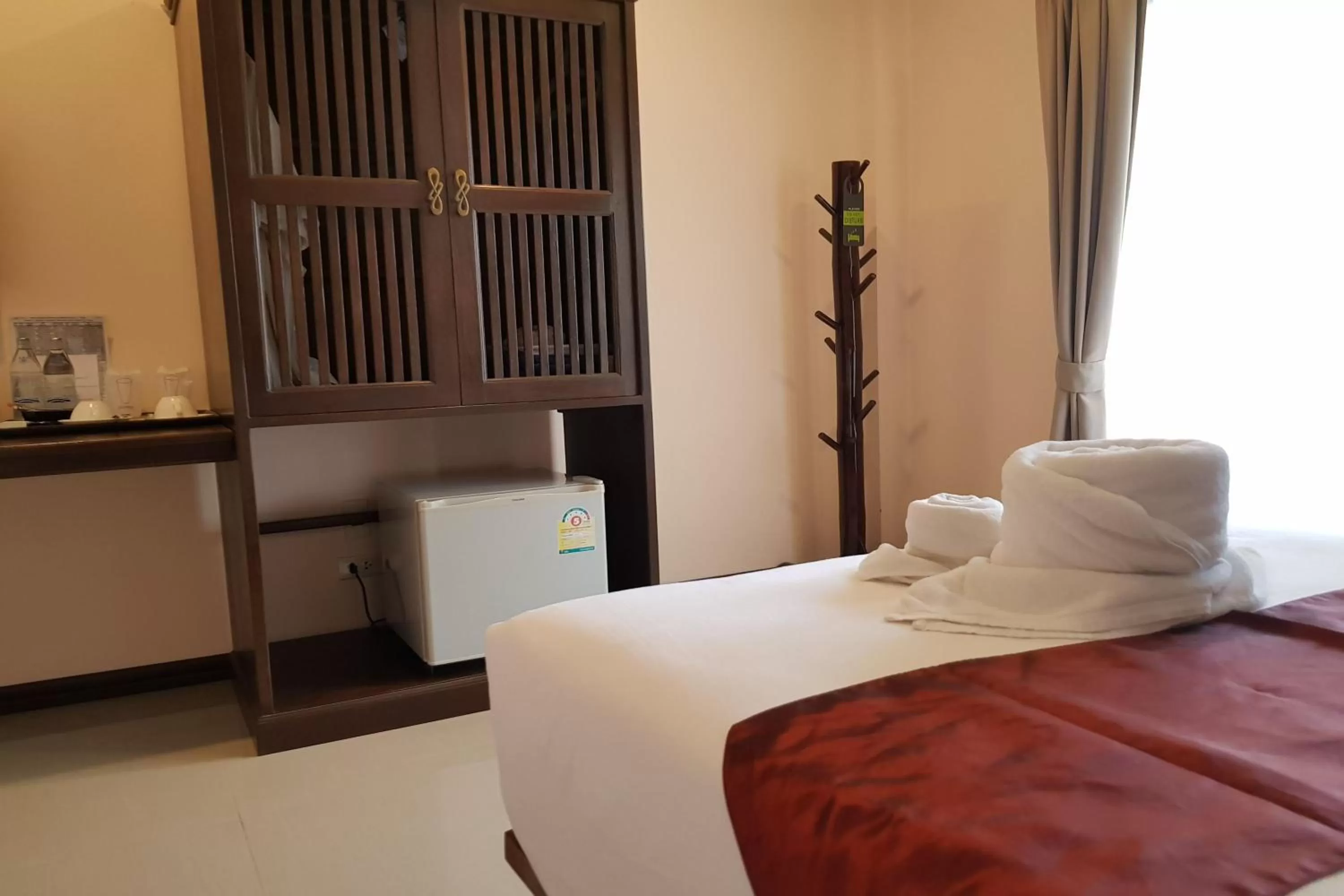 Bedroom in Pai Sukhothai Resort SHA Extra Plus