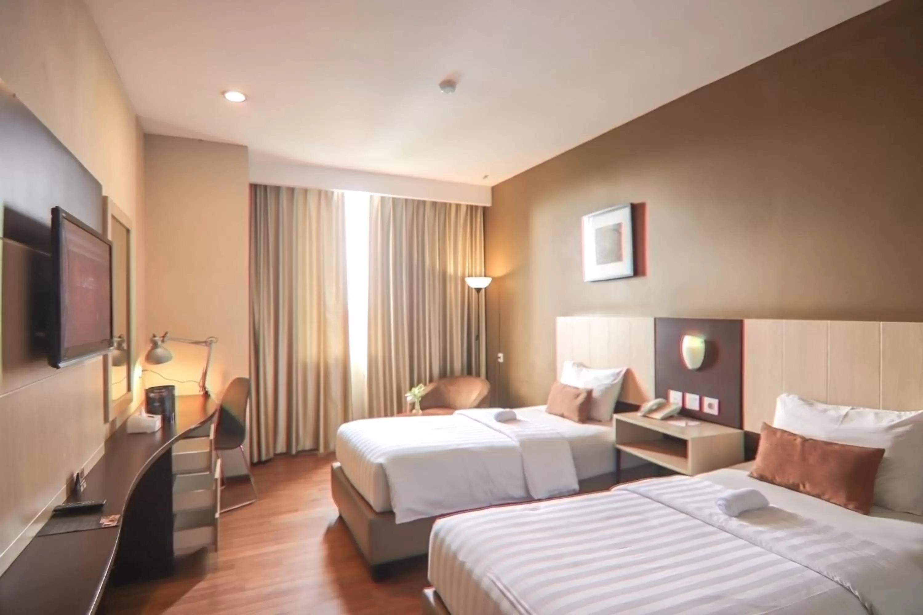 Deluxe Twin Room in De Laxston Hotel Yogyakarta, Azana Hotels Collection